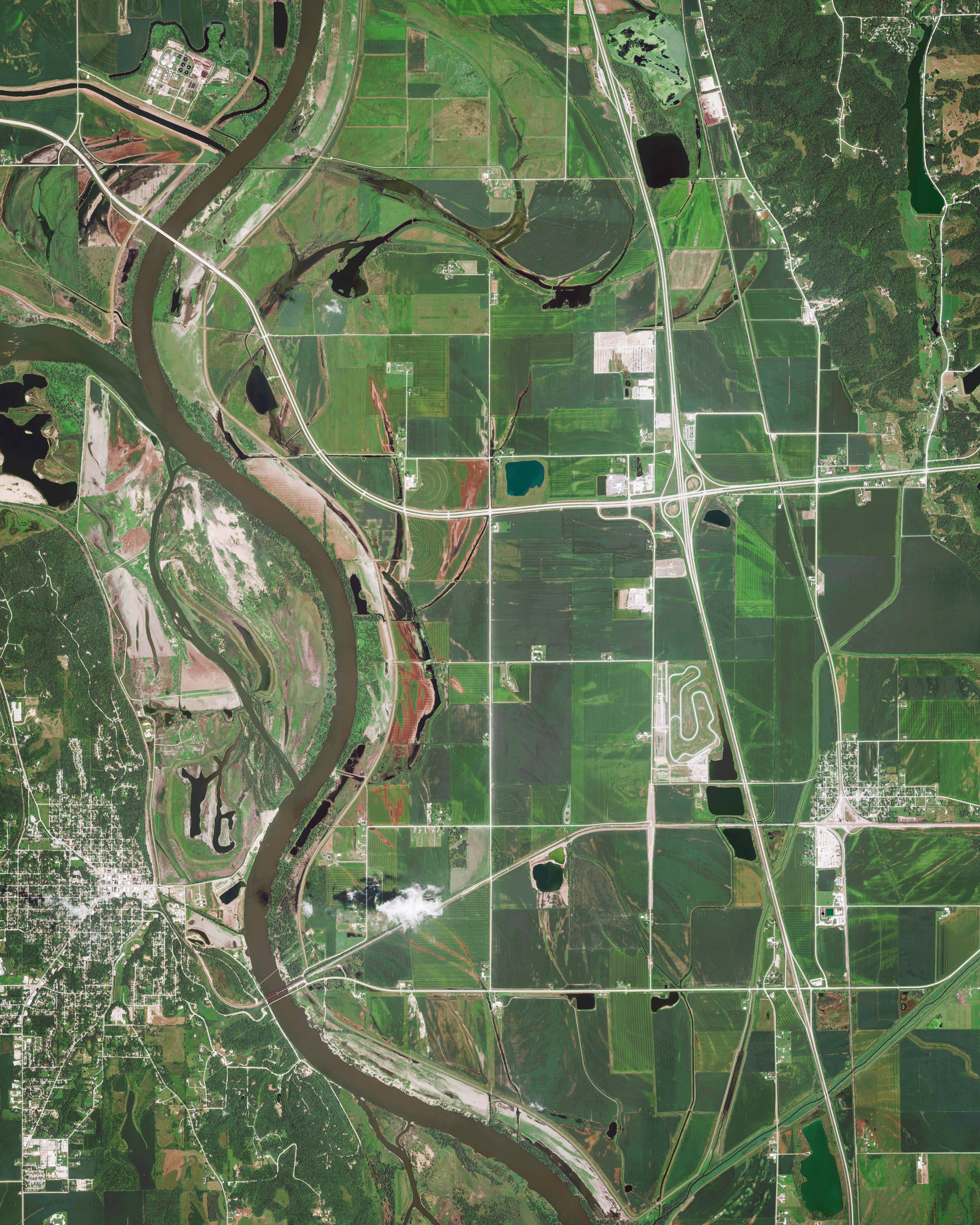 WATCH: These jaw-dropping juxtaposes shows farmland at the Nebraska-Iowa border before and after catastrophic flooding occurred there last week. Floods across the Missouri River Basin were caused by heavy rainfall and rapid snowmelt, and the total cost of damages in Nebraska has exceeded $1.3 billion. At least 2,000 homes and 340 businesses have been damaged or destroyed, and losses to infrastructure, farmland and livestock are monumental. 41°01'17.8"N, 95°50'58.6"W Source imagery: DigitalGlobe
