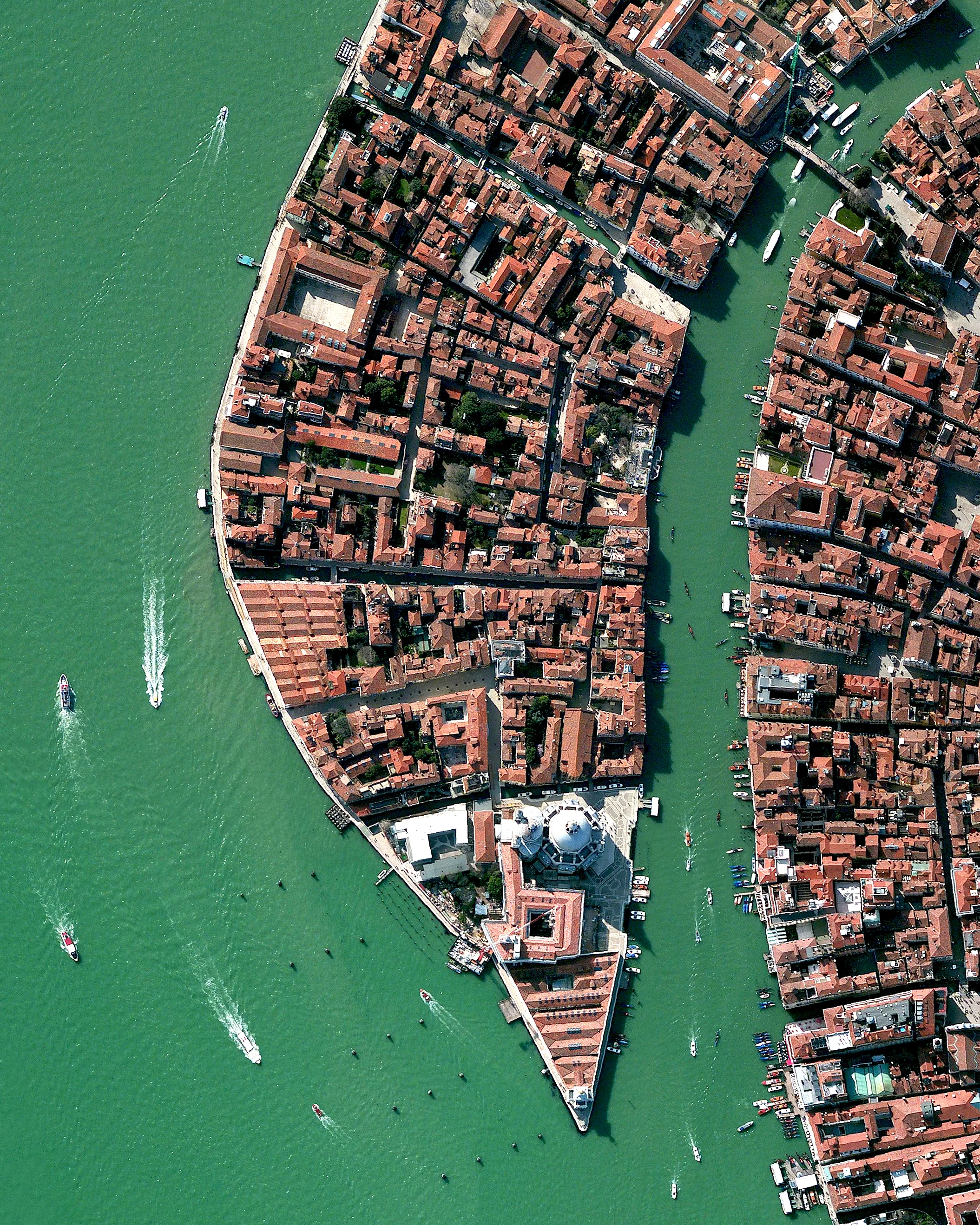 This Overview shows part of the Dorsoduro sestiere in Venice, Italy. A sestiere — which comes from the Italian “sesto,” meaning sixth — is a subdivision of an Italian town or city divided into six districts. Dorsoduro is Venice’s university district and is filled with bars, restaurants, indie shops, vintage fashion boutiques and art galleries, such as the Peggy Guggenheim Collection. 45°25'49.3"N, 12°20'00.4"E Source imagery: DigitalGlobe