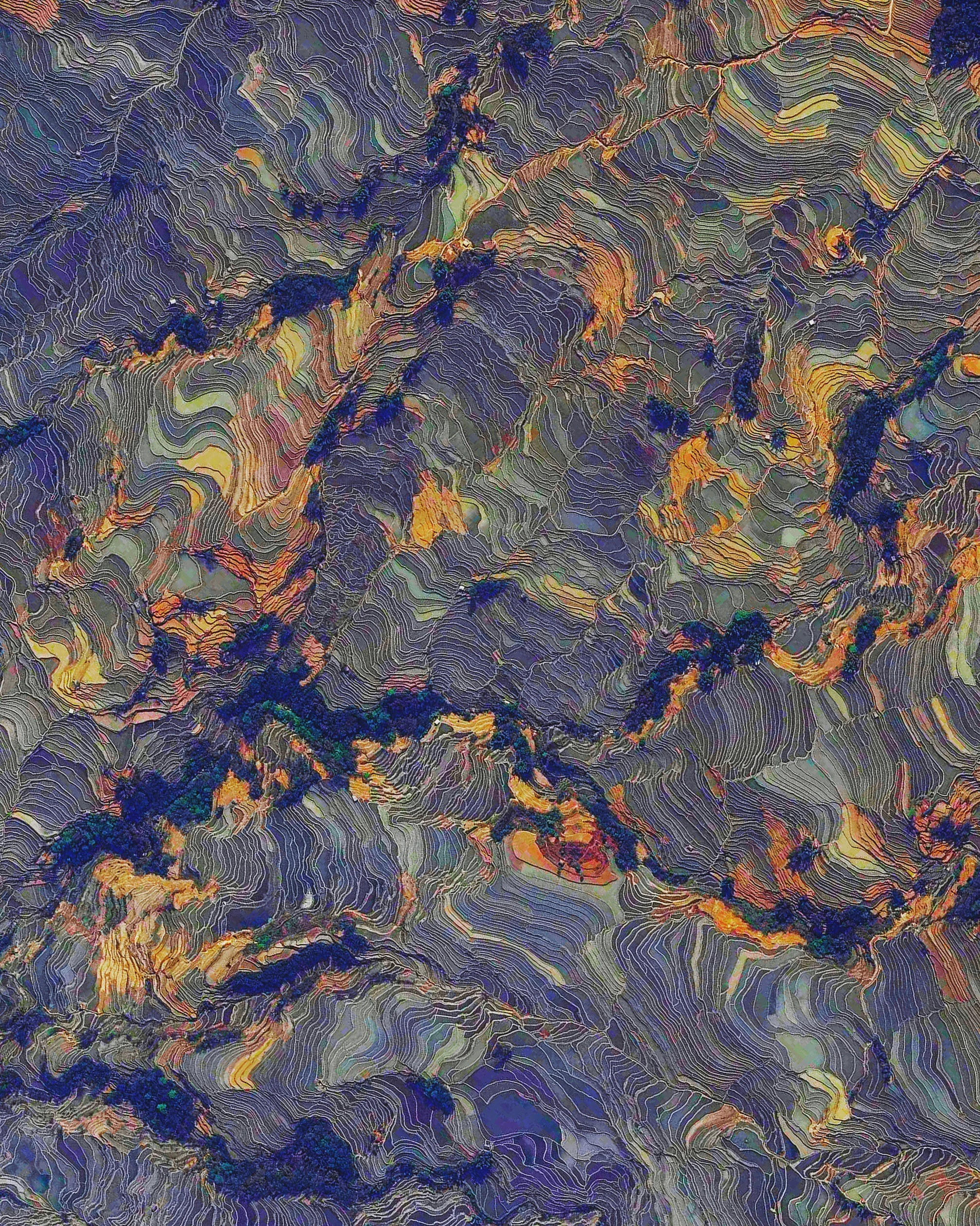 Rice paddies cover the mountainsides of Yuanyang County, China. Constructed in “steps” by the Hani people for the last 1300 years, the slope of the terraces varies from 15 to 75 degrees with some having as many as 3,000 steps! The stunning colors that you see here are indeed real and result from the presence of water and certain plants within the terraces. 23°09′32″N, 102°44′41″E Source imagery: DigitalGlobe