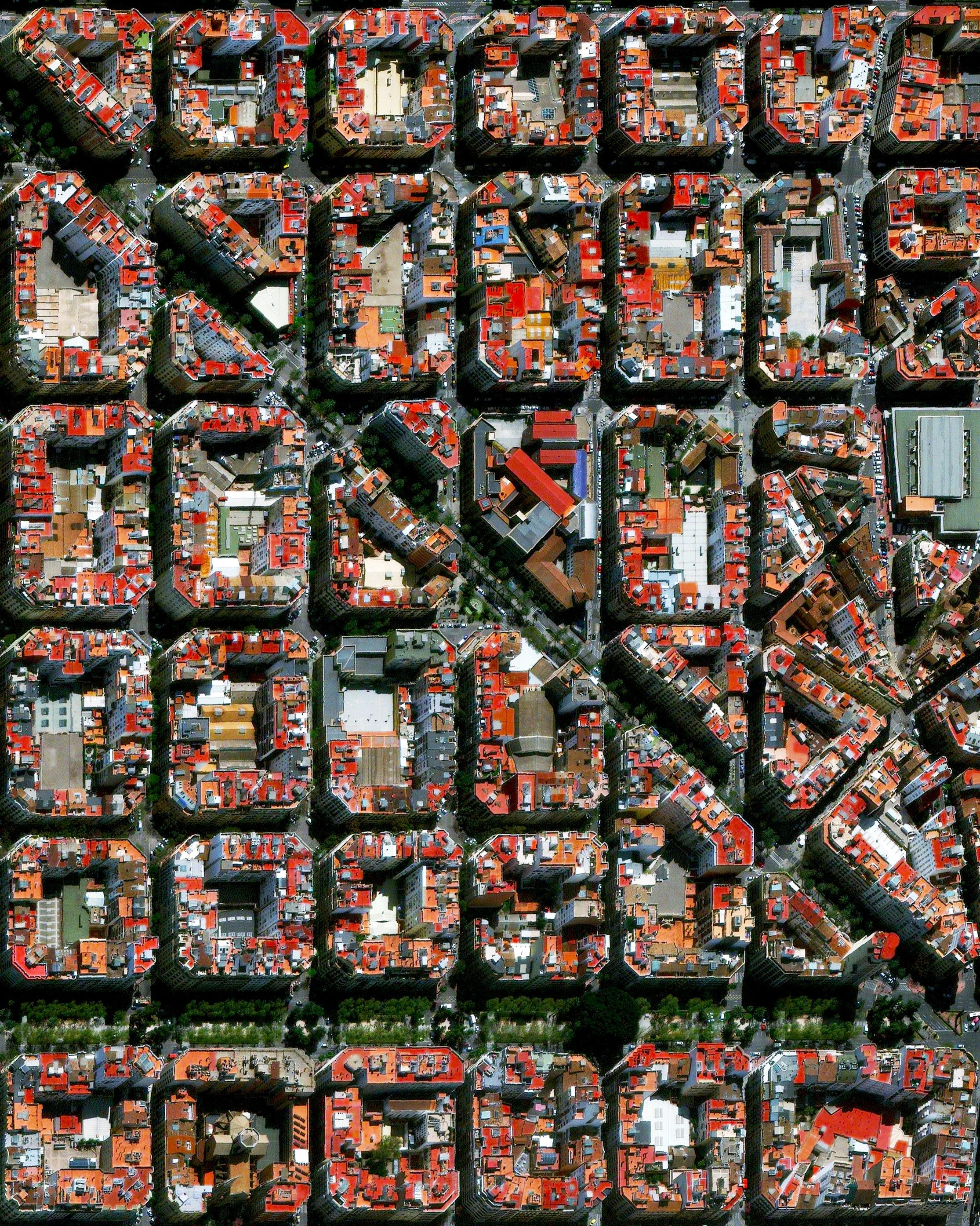 The urban plan of the L’Eixample district in Valencia, Spain, is characterized by long straight streets, a strict grid pattern crossed by wide avenues, and apartments with communal courtyards. A similar layout was used for the district of the same name in Barcelona. 39.464722°, -0.370000° Source imagery: Maxar Technologies