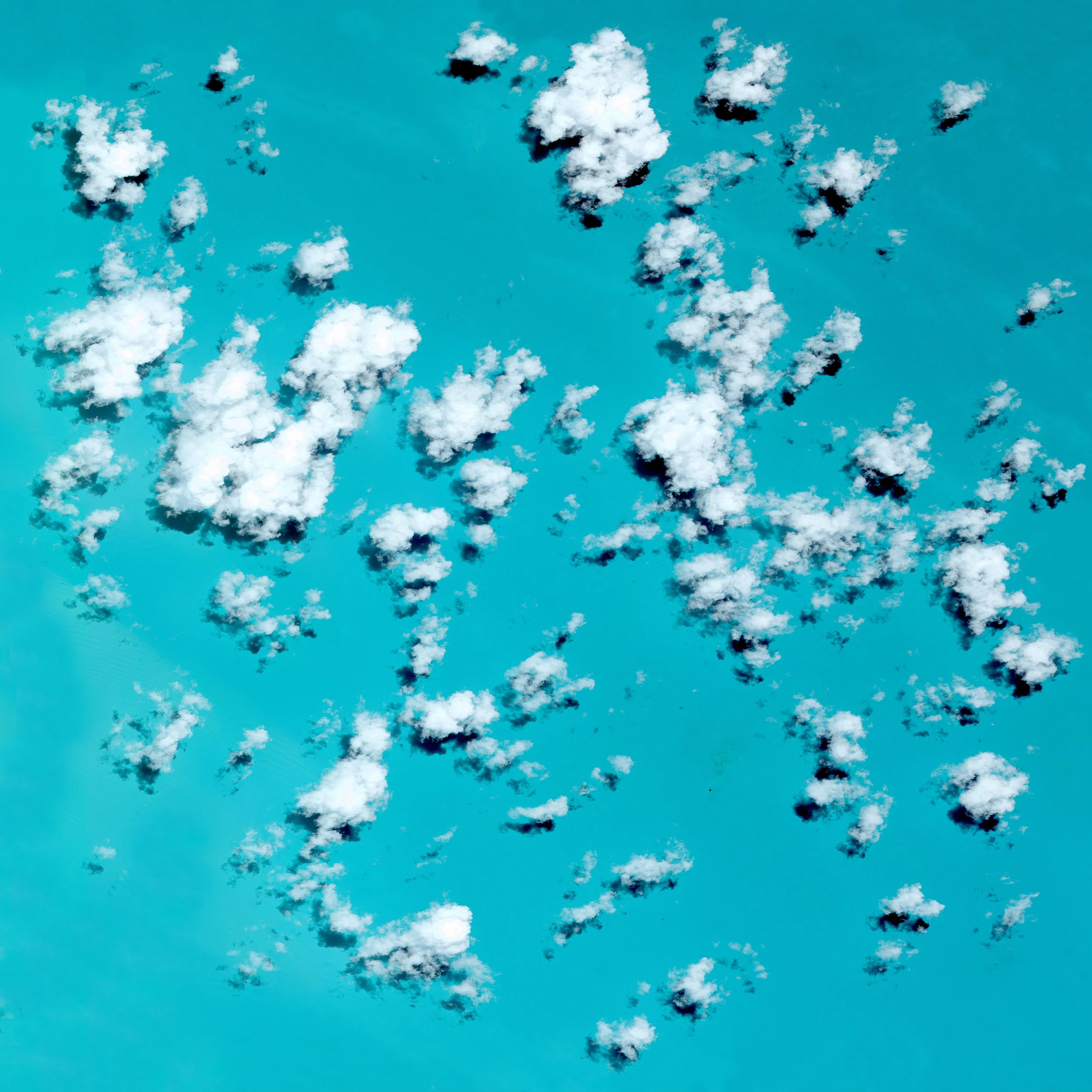 Clouds cover the Atlantic Ocean in the waters offshore The Bahamas. Altogether, the Bahamian archipelago consists of more than 700 islands, cays and islets and encompasses 180,000 square miles (470,000 square km) of ocean space. Much of the water surrounding The Bahamas is comparatively shallow and thus takes on a light aqua color as sunlight reflects off the sand and reefs near the surface. 24.398083°, -76.792285° Source imagery: Maxar Technologies