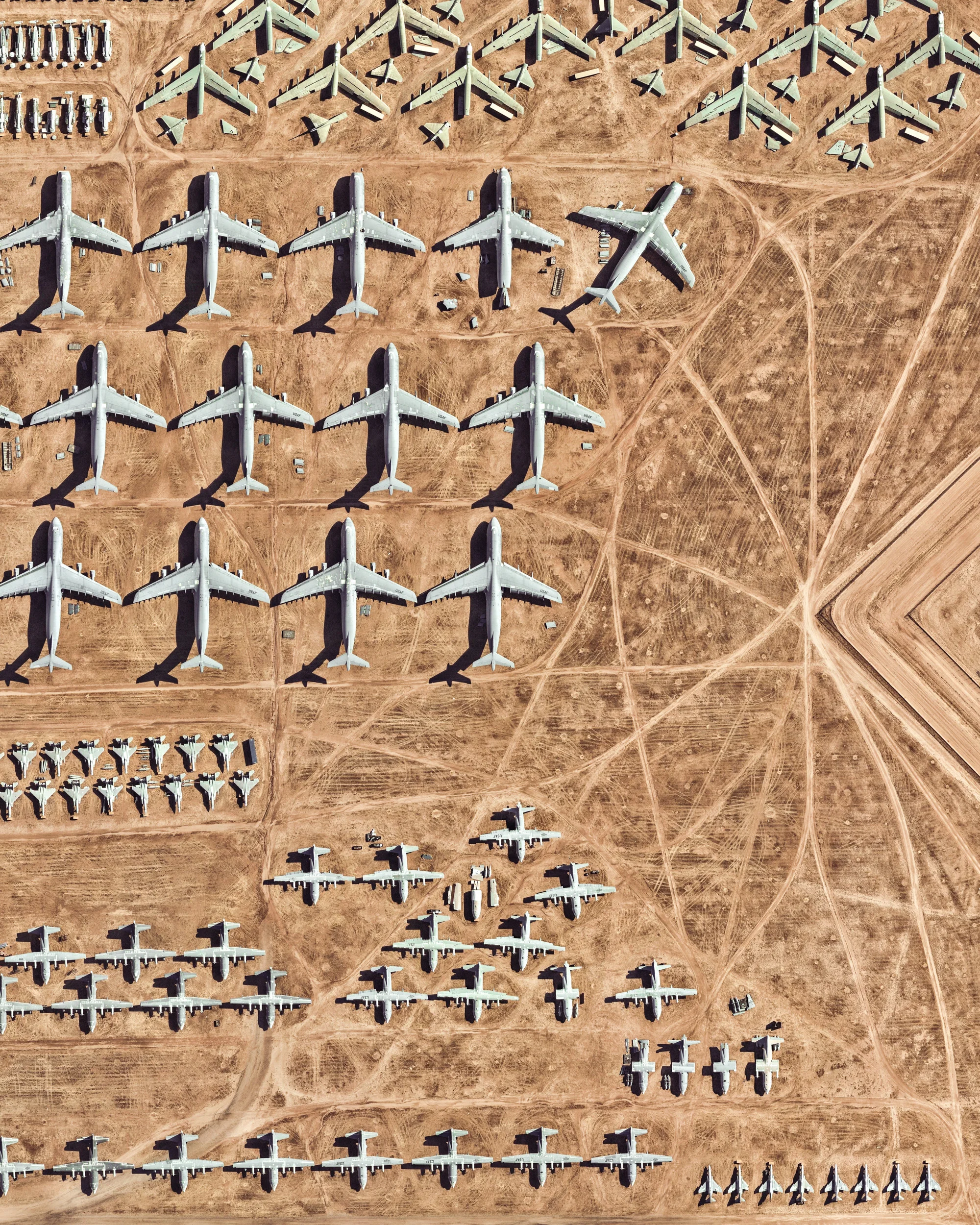 The largest aircraft storage and preservation facility in the world is located at Davis–Monthan Air Force Base in Tucson, Arizona. The facility - run by the 309th Aerospace Maintenance and Regeneration Group - contains more than 4,400 retired American military and government aircraft. 32.150574°, -110.827969° Source imagery: Nearmap