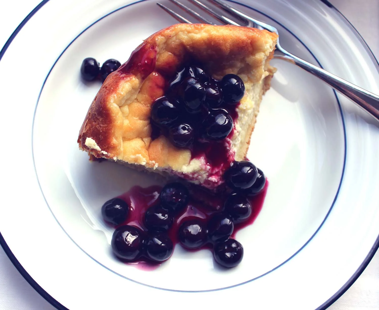 Baked Blintzes with Blueberry Sauce | Image: Laura Messersmith