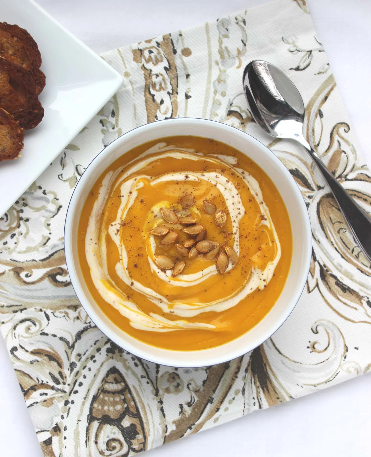 Curried Winter Squash Soup with Pumpkin Greek Yogurt C rème Fraîche | Image: Laura Messersmith