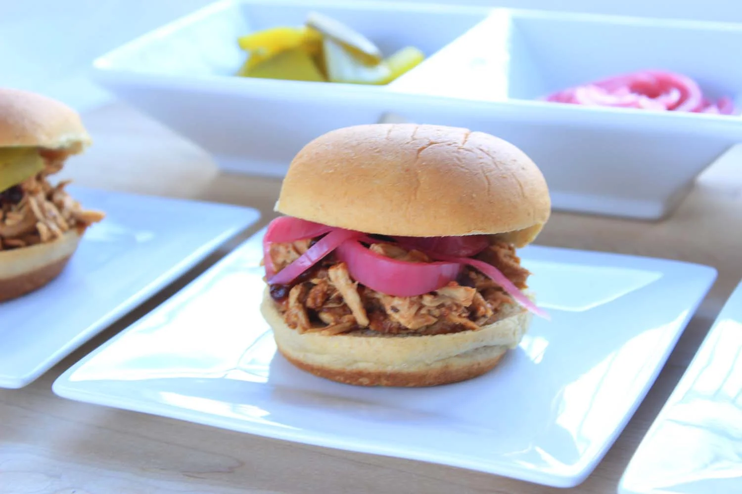 Black Pepper Molasses Pulled Chicken Sliders | Image: Laura Messersmith