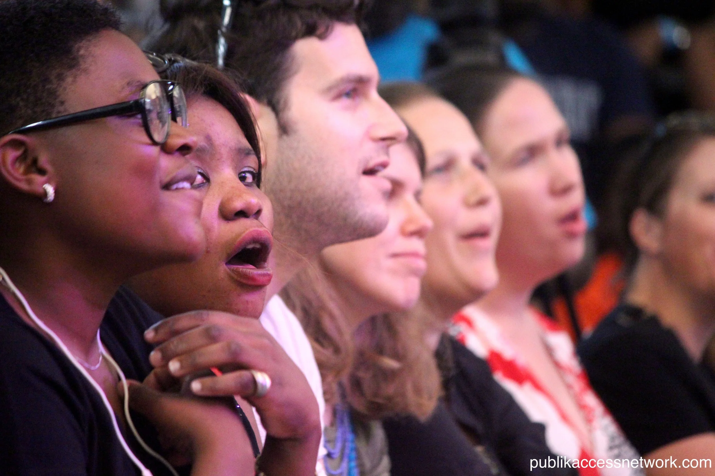 Members of the audience cheering on