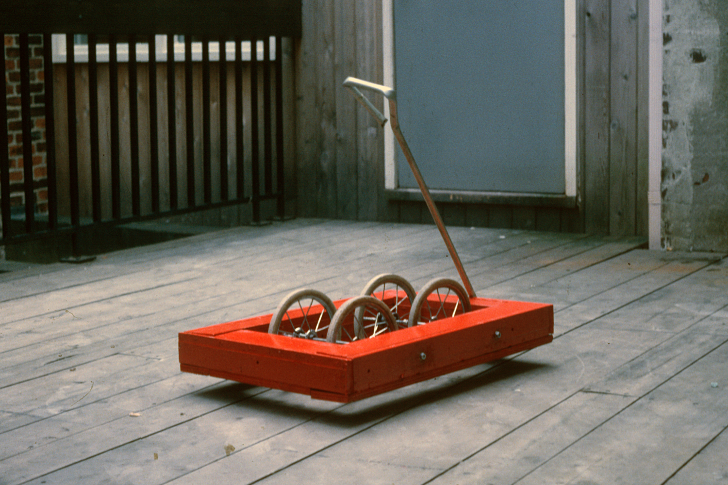 Untitled (Red Wheely)