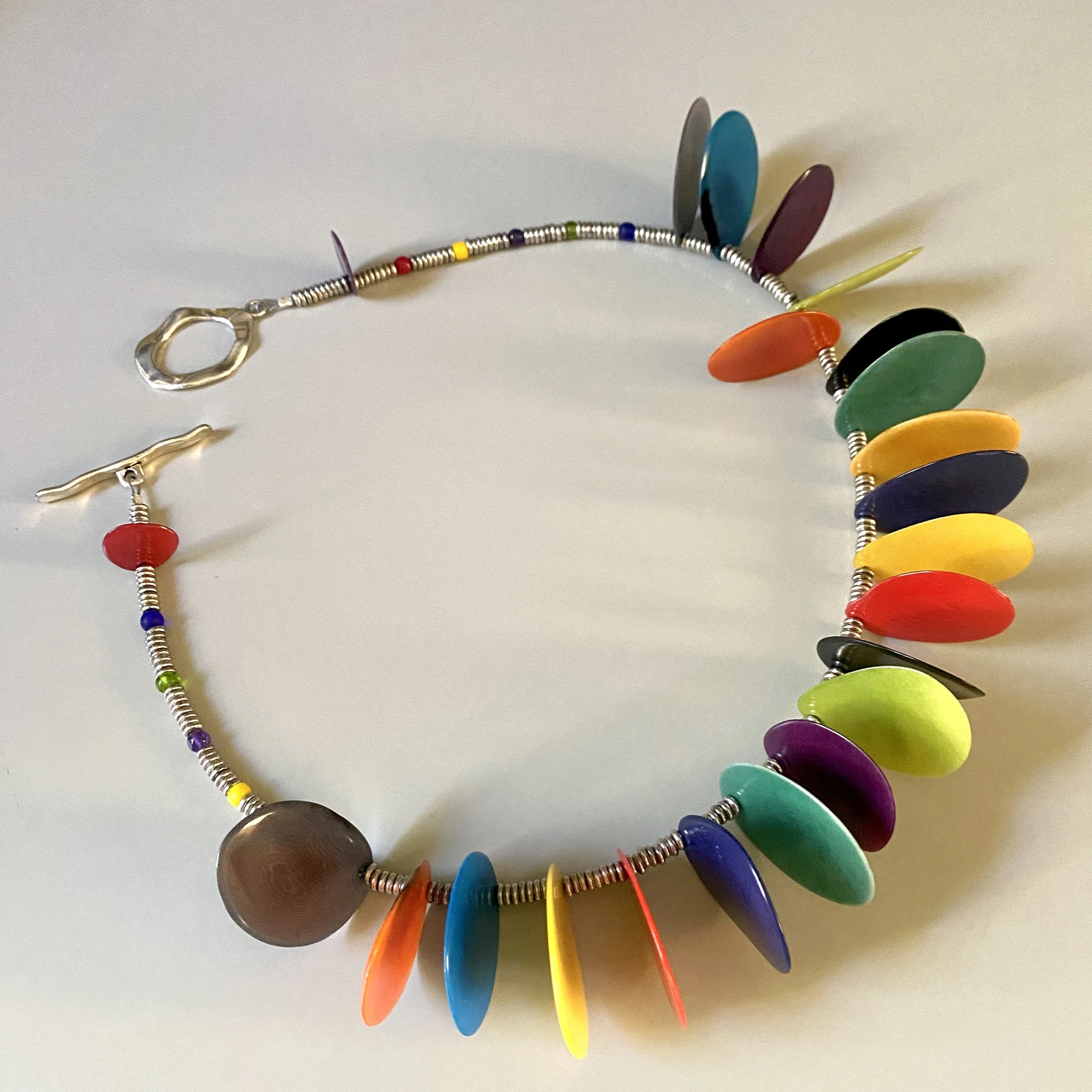 Tagua Nut Slices Silver 19 in.JPG