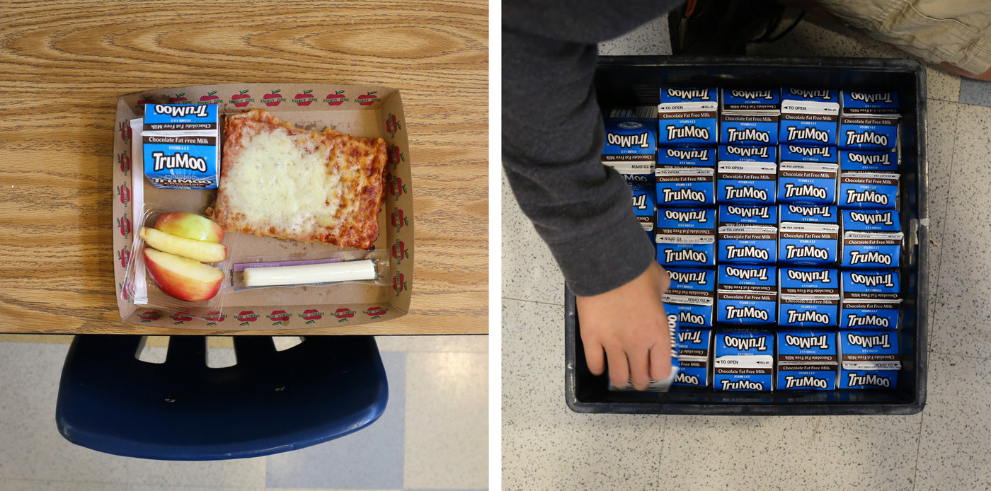 A lunch left behind by a student at Franklin Sherman Elementary School. Unopened milk from lunch is boxed up to be sent to the food bank. Cheese sticks are also donated. Victoria Milko/NPR