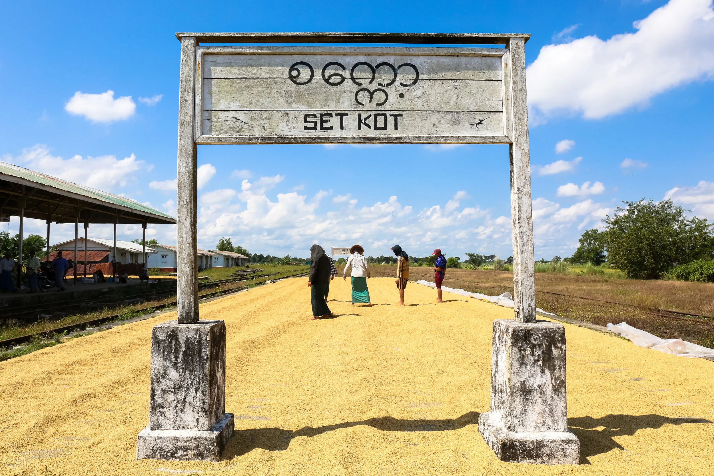 Rice is dried at a train station built under military-junta rule. Irrawaddy Region, Myanmar.