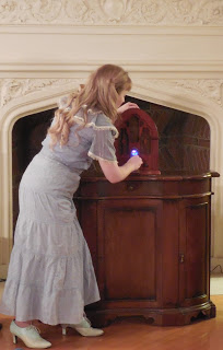 Dana Haberern as Aurora Medium in Meet the Mediums