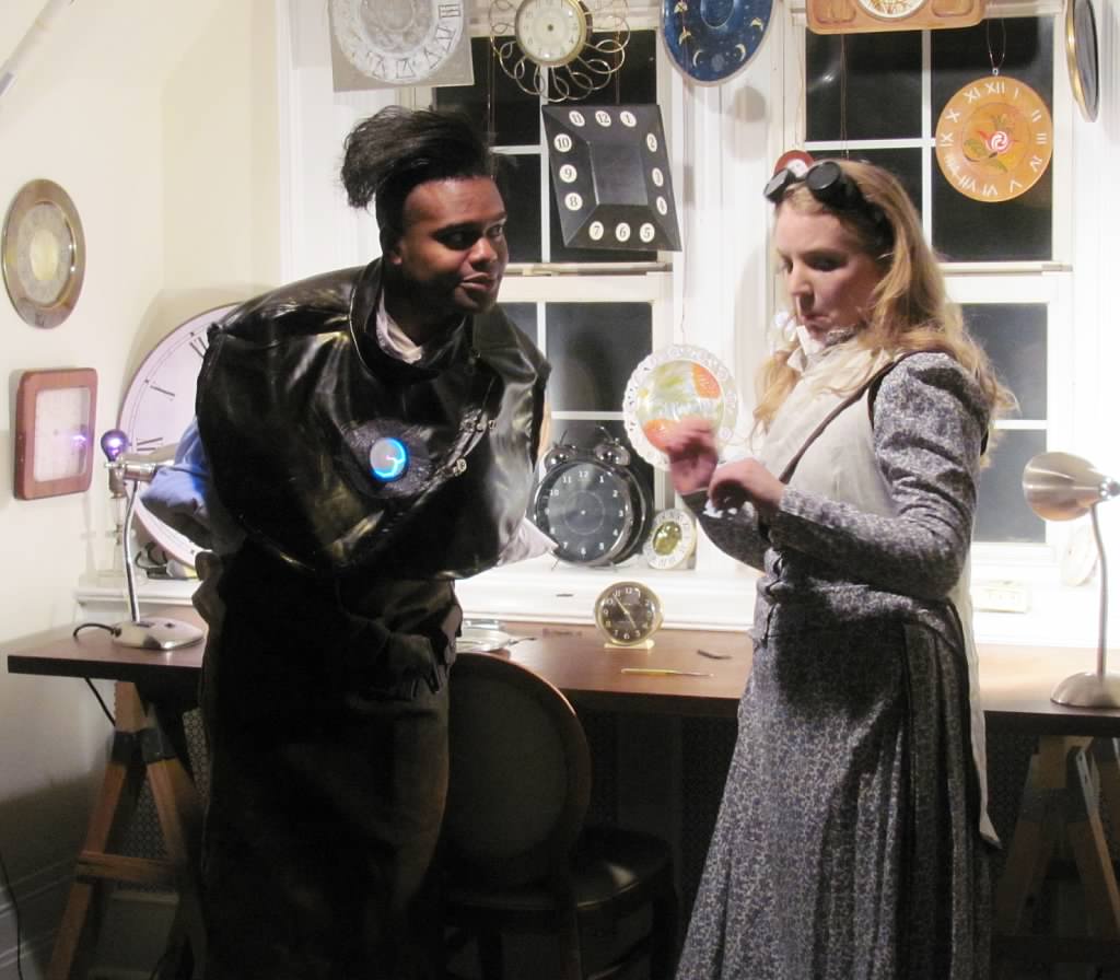 Sebastian Cummings as Labraid the Clocksmith and Dana Haberern as Persephone Proserpina
