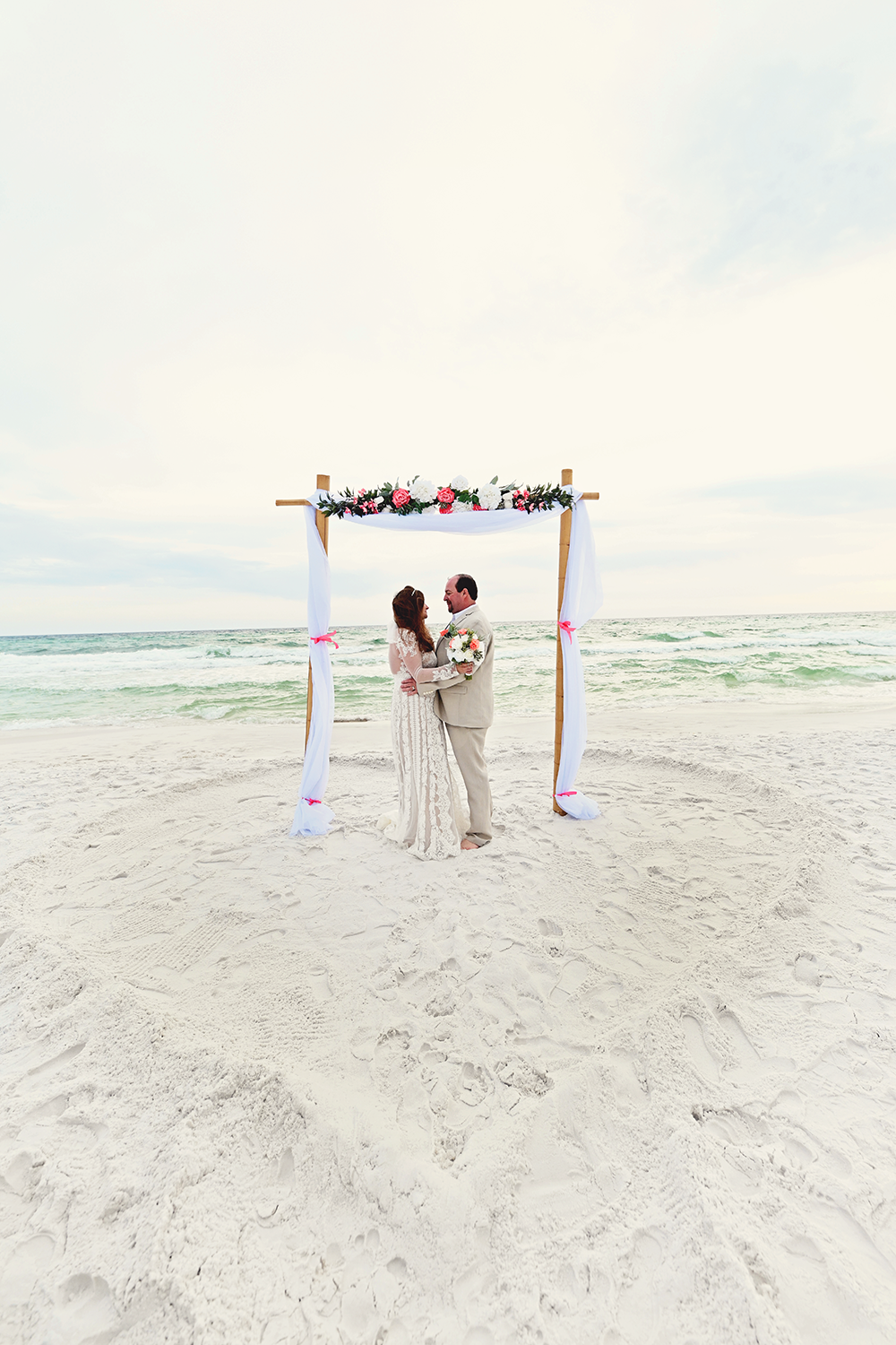 heart in the sand wedding photos