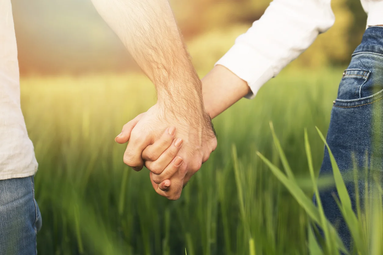spouses holding hands iStock-522331282.jpg