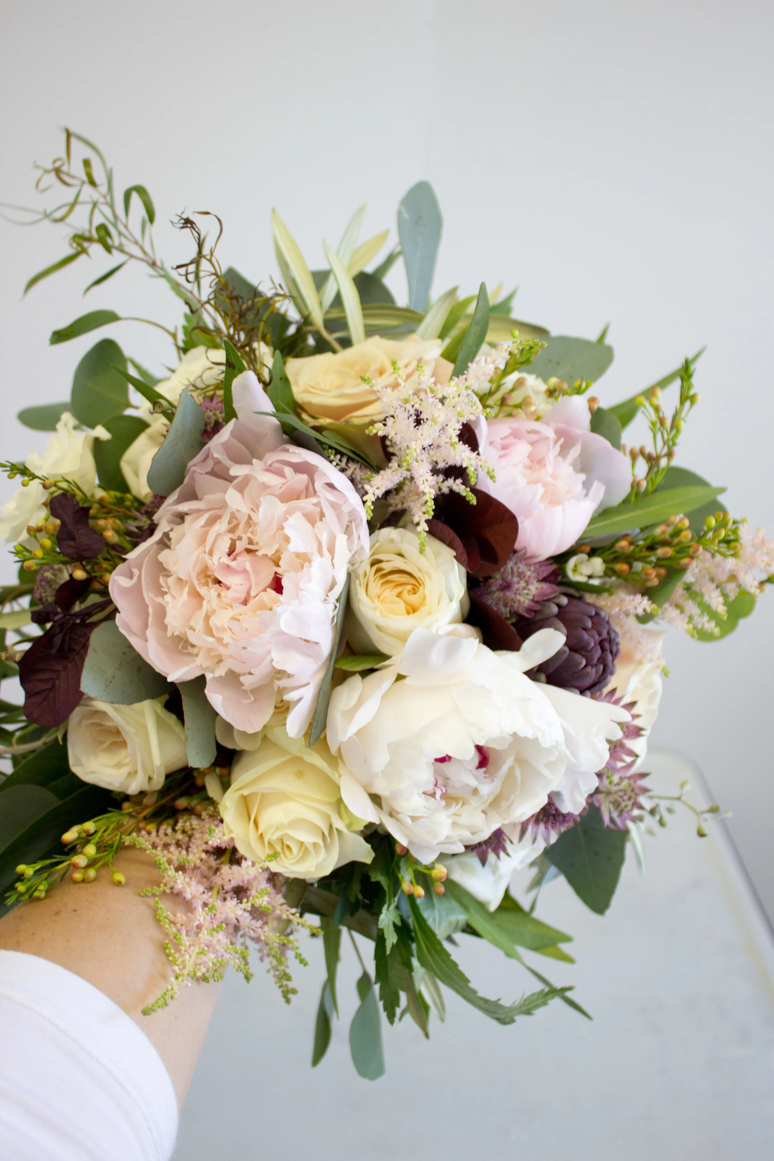 Bridal Bouquet with Peonies, Garden Rose, Artichoke, Waxflower, Astilbe, Astrantia, and Various Greenery