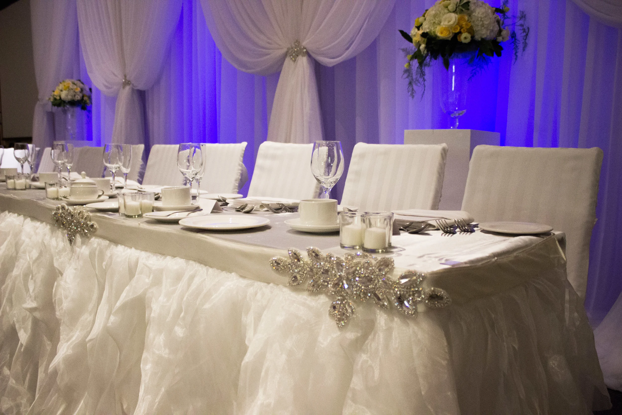 Inside at the reception. Draping and head table linen from Simply Beautiful decor. 