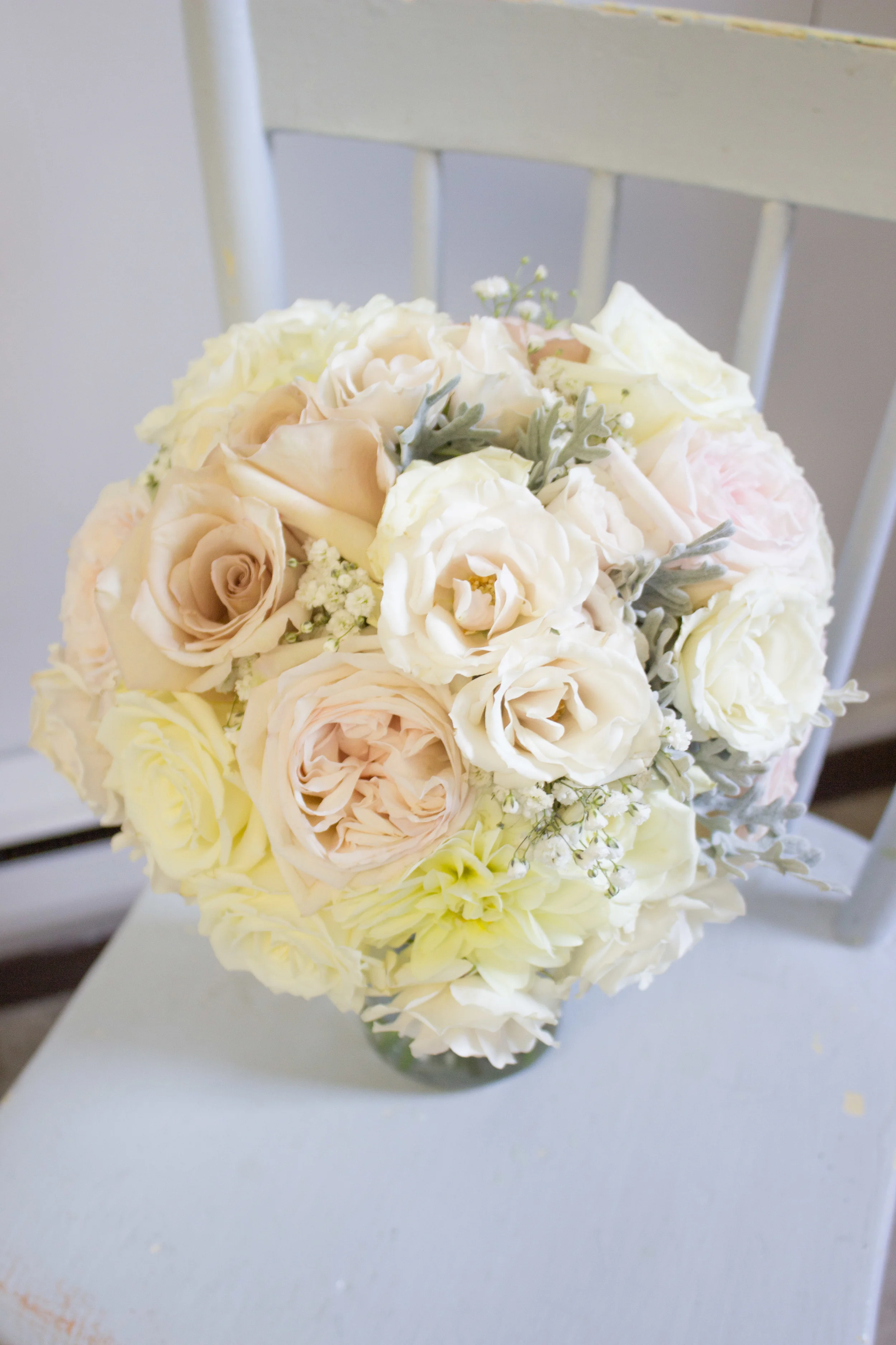 Brides Bouquet: Garden roses, dahlias, baby's breath, roses, freshly picked dusty miller from my garden! 