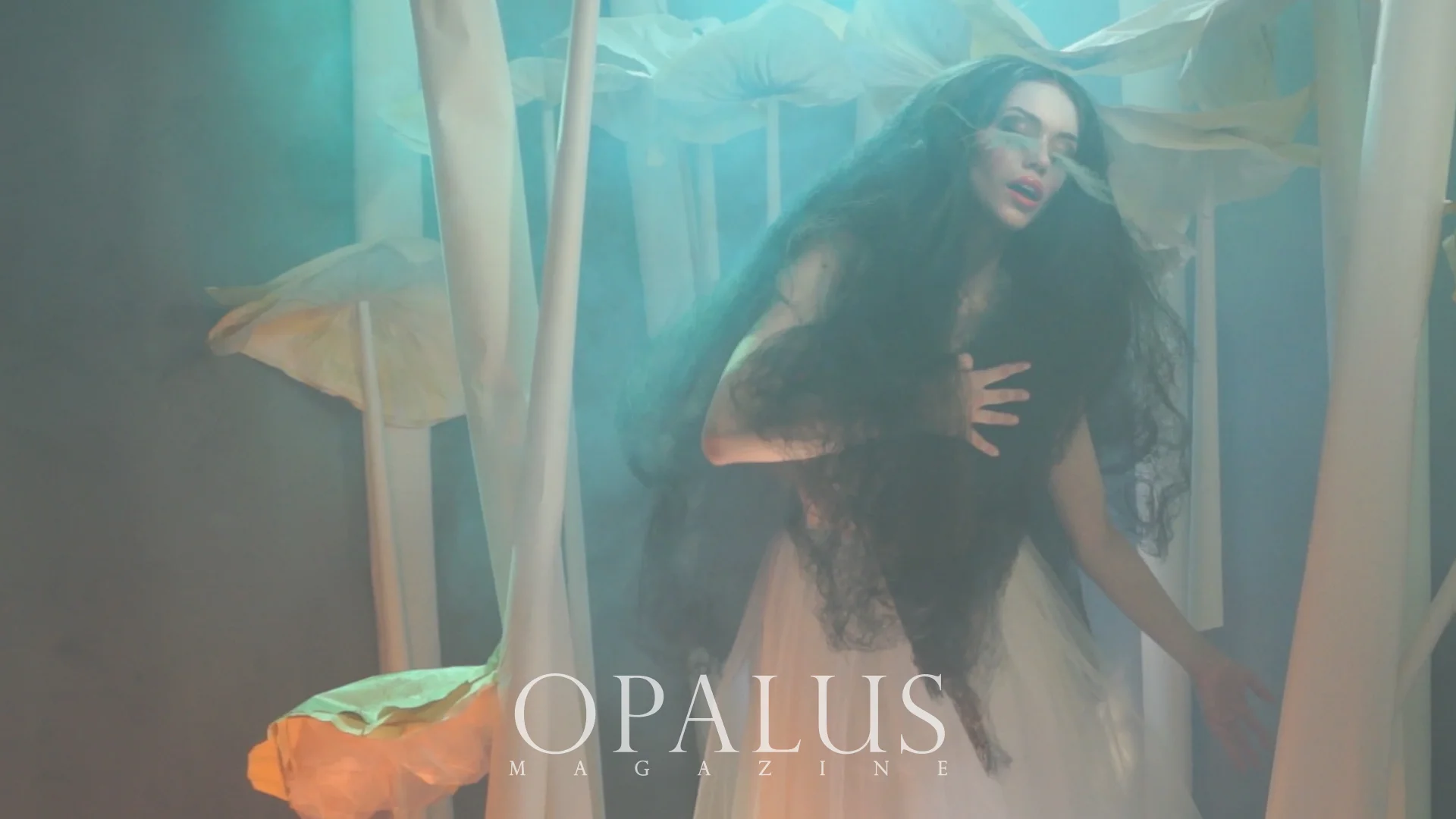 Image from fashion film "IMAGINATION LAND" presented by OPALUS Magazine. Team Credits: Videographer/Creative Director / Editor / Set Design - Malorie Shmyr Lighting Designer - Kris Wedgwood Makeup Artist - Krystle Ash Hair Stylist - Emily Strocher On-set Hair assistant - Geri Roberts Model - Amanda Rose of Lucier Model Management