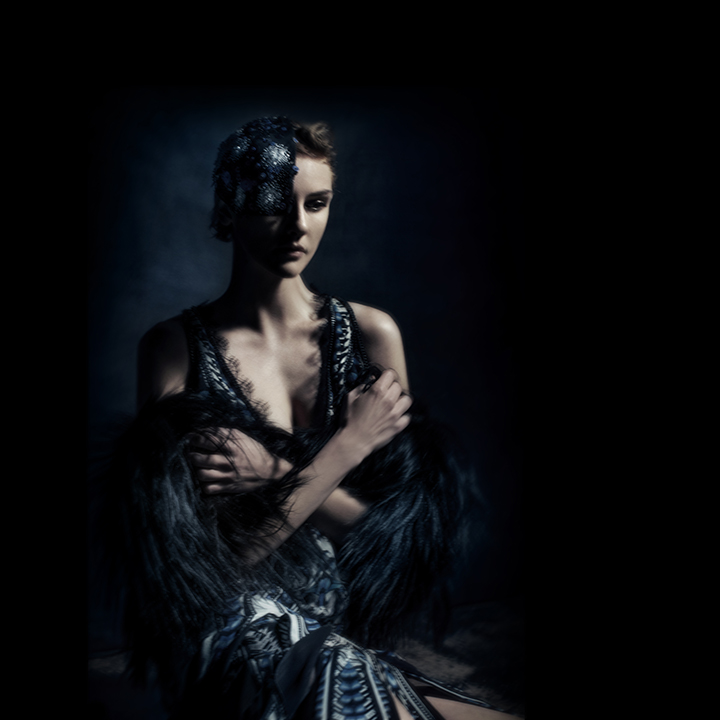 Fur by Melchiorri Embroidered hat by Giorgio Armani Printed Dress by Roberto Cavalli