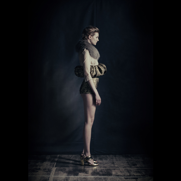 Rompers by Gian Marco Funari Fur by Roberto Cavalli Shoes by Fendi