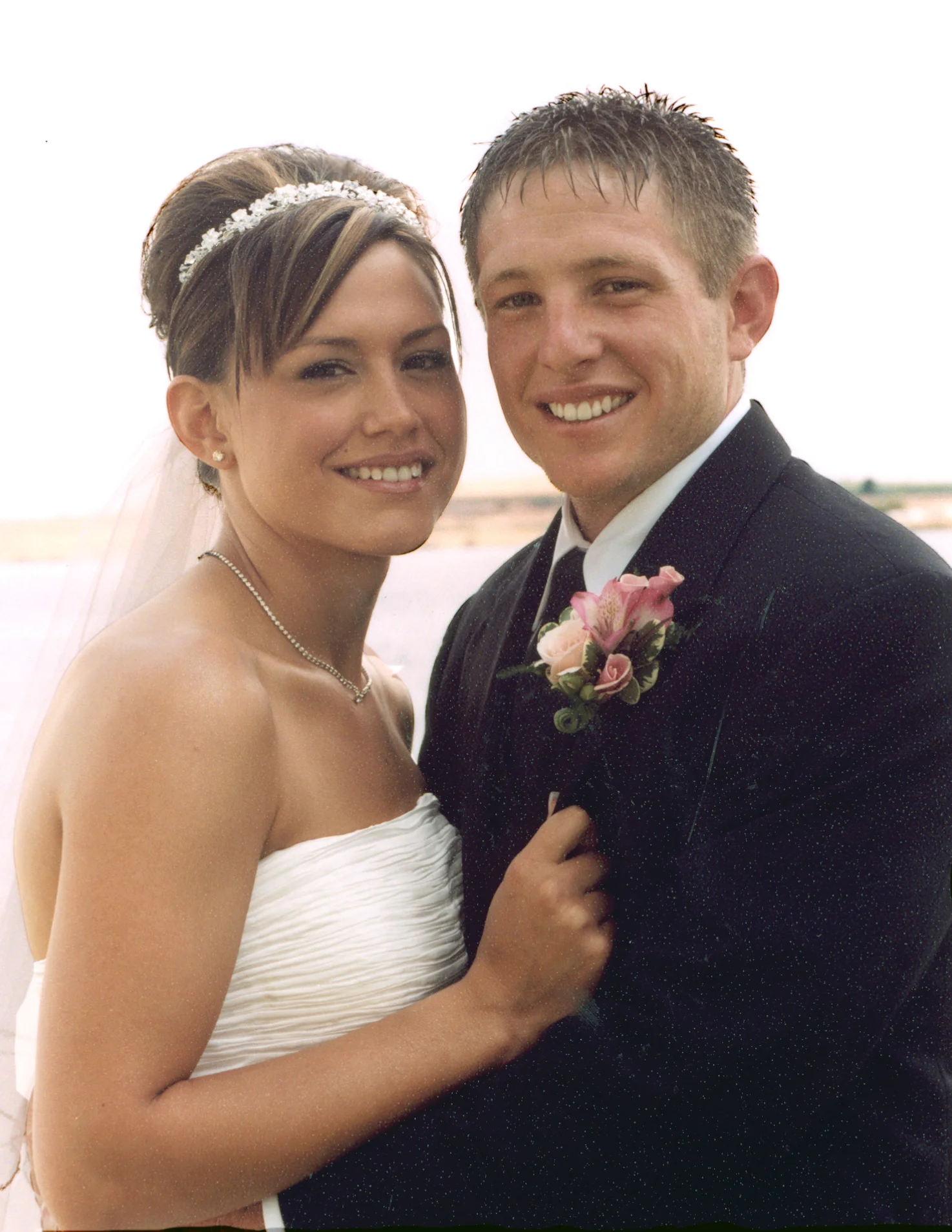 Abbott, Carlee_closer with groom.jpg