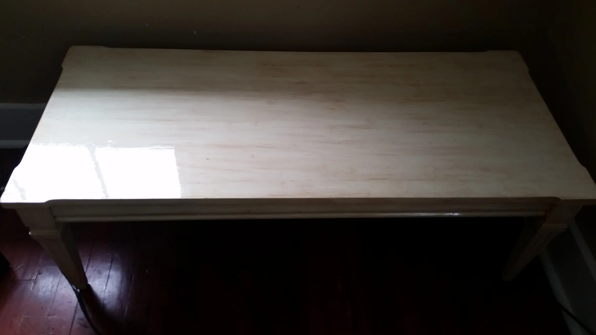 Coffee table after antique faux finish application. We finished it with a glossy varnish.