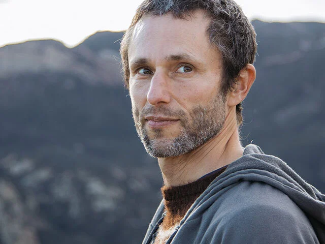 Get Charles Eisenstein Background