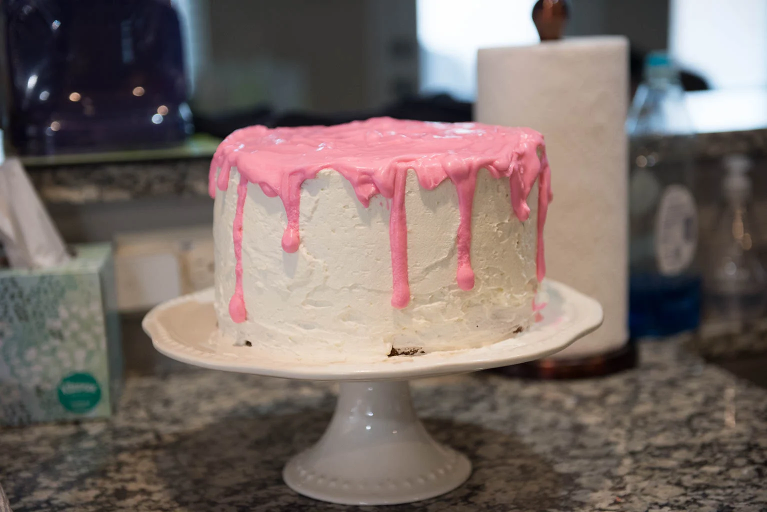 I started with the drip edges first, then smoothed out the top of the glaze pink icing