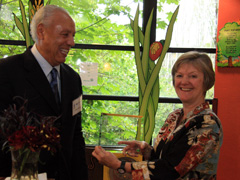 Dr. Sherris receiving the Odessa Brown Children's Clinic's 2010 "Spirit of Caring" award from Lenny Wilkens, trustee of Seattle Children’s Hospital Foundation