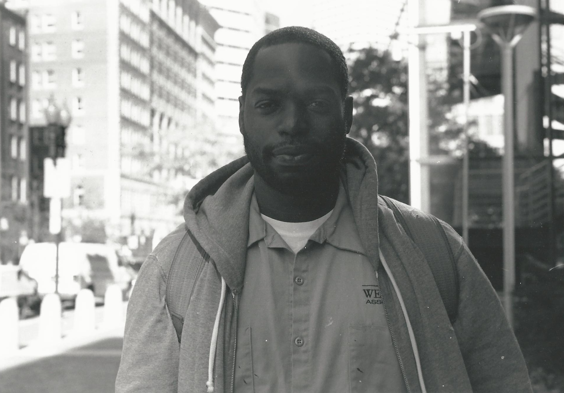 Finally got this photo developed. This was outside South Station. The man asked for a dollar for his bus ride home. I said I would give him a dollar if I could take his picture. This is the result. Canon AE-1 with a 50 mm f/1.8 