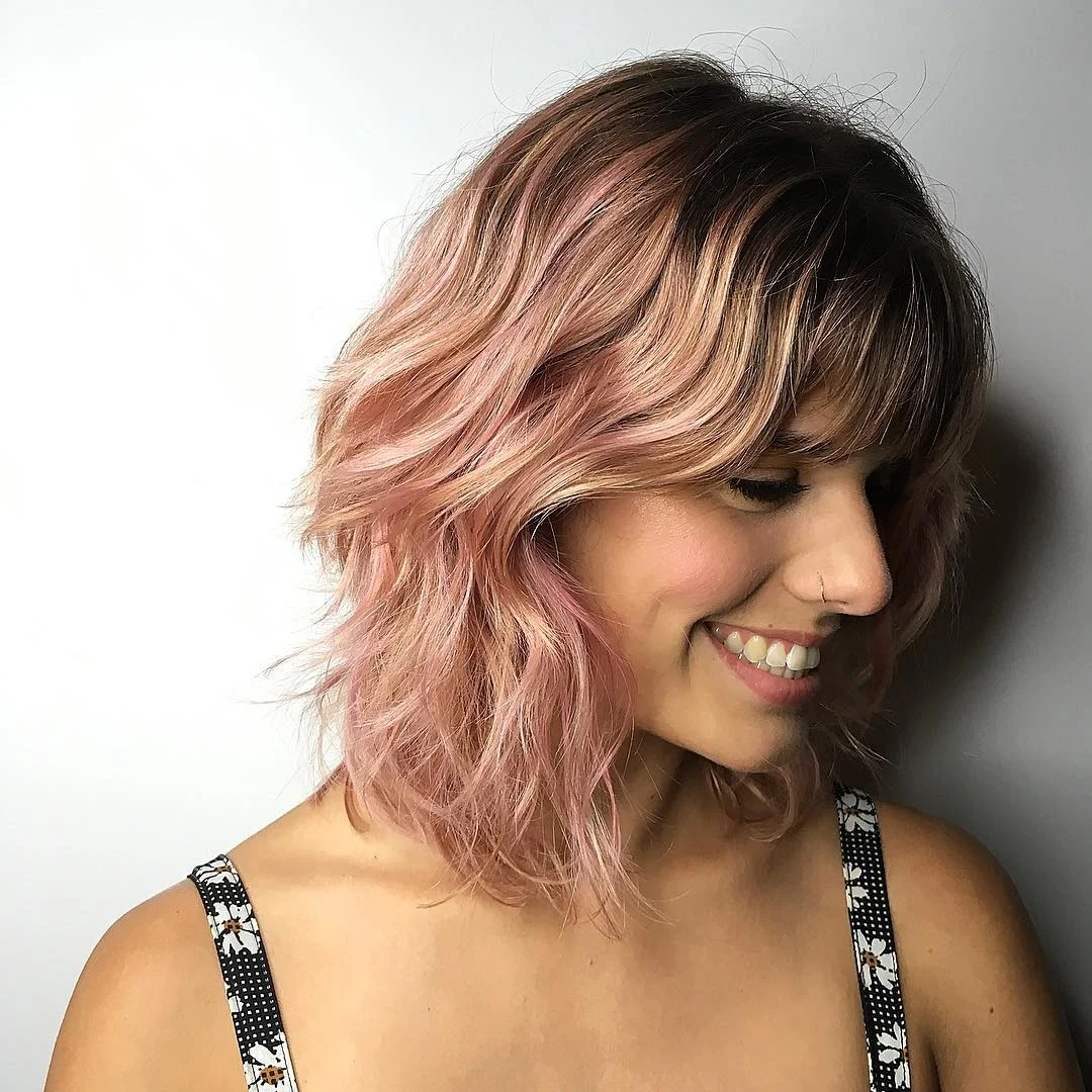 Rosey blonde 🌹 created by Hair Loft River North stylist Erin G .
