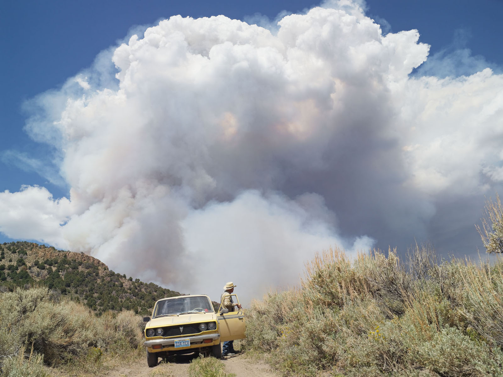 "George Chasing Wildfires, Eureka Nevada, 2012" © Lucas Foglia