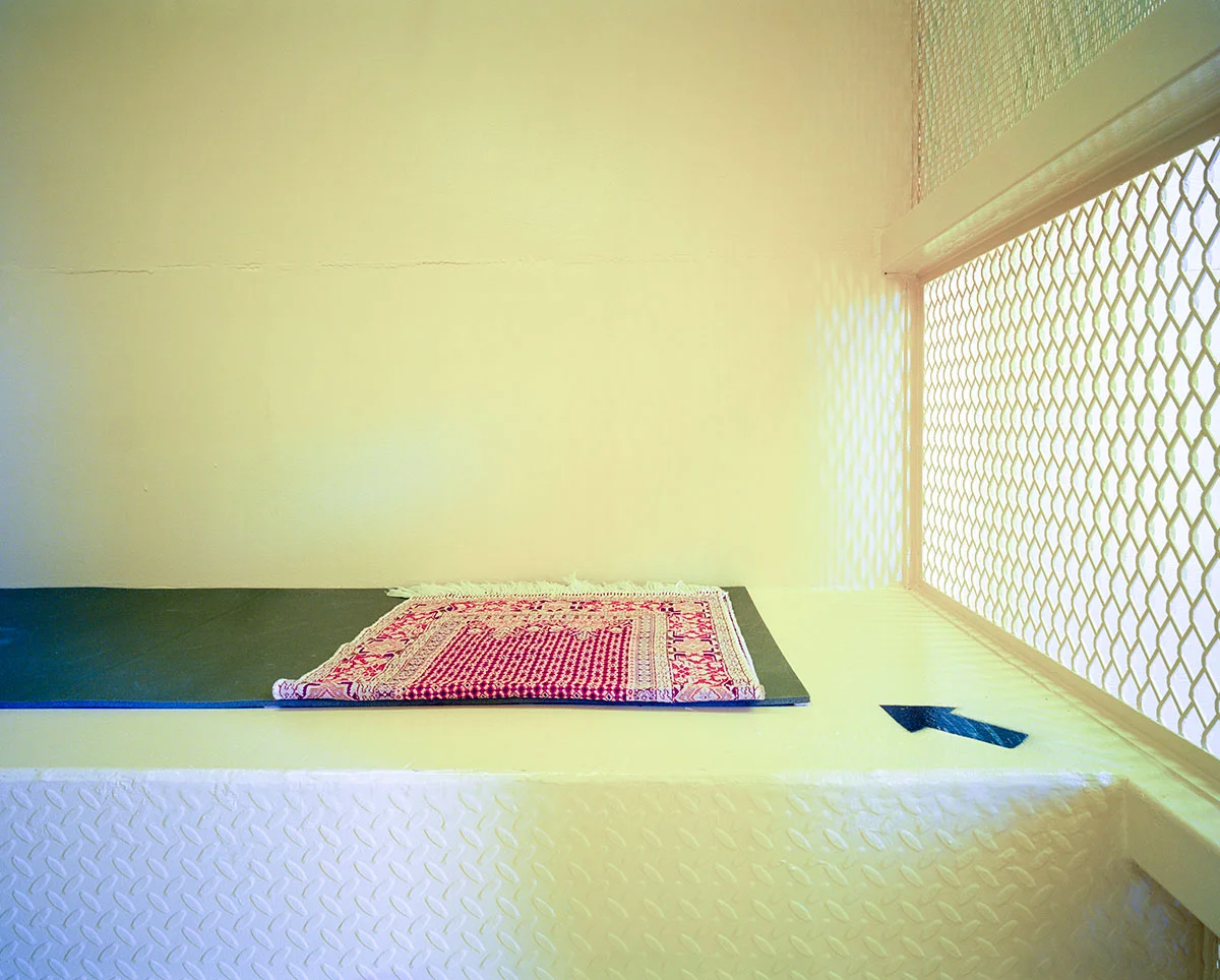 Prayer Rug with Arrow to Mecca, Camp Echo U.S. Naval Station Guantánamo Bay, Cuba (2015) © Debi Cornwall