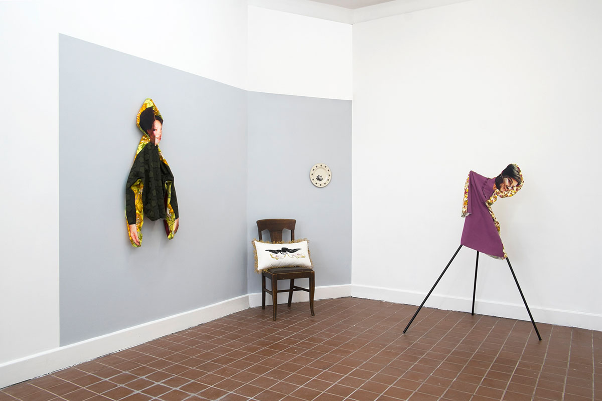 Left to Right: RC, 2018; polyester, cotton; 48 x 18 x 8 in. Bean Gilsdorf. Bless This Mess, 2018; pillow with hand embroidery; polyester, cotton, fringe, poly stuffing; 22 x 12 x 6 in. Republic, 2018; ceramic plate, 10.75 inch diameter. LB, 2018; polyester, rayon, wood, paint; approx. 60 x 44 x 29 in.