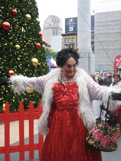 The Countess Lola Montez serenades those gathered for the procession with her rendition of "Christmas in San Francisco."