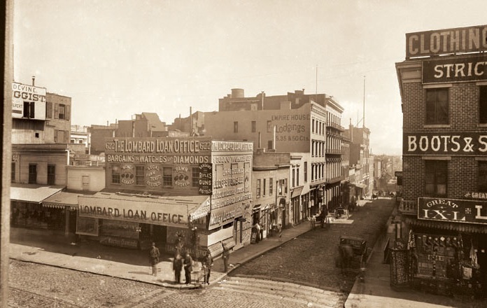 The block of Commercial Street, in San Francisco, where Emperor Norton lived from 1863 until his death in 1880. This 1888 photograph captures the view looking east from Kearny Street. Source: California Views: The Pat Hathaway Photo Collection .
