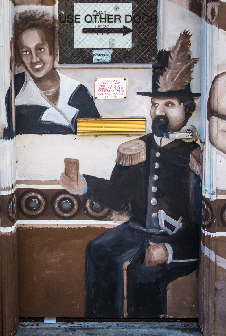   Detail of San Francisco Chocolate Factory mural (2005–6) by Jerry Warmsley, Jr., and Alyssa Morgan. Lost, 2016.  Previously located at the Factory's former offices and retail shop at 286 12th Street, San Francisco. Photograph © 2014 Larry Jones. So