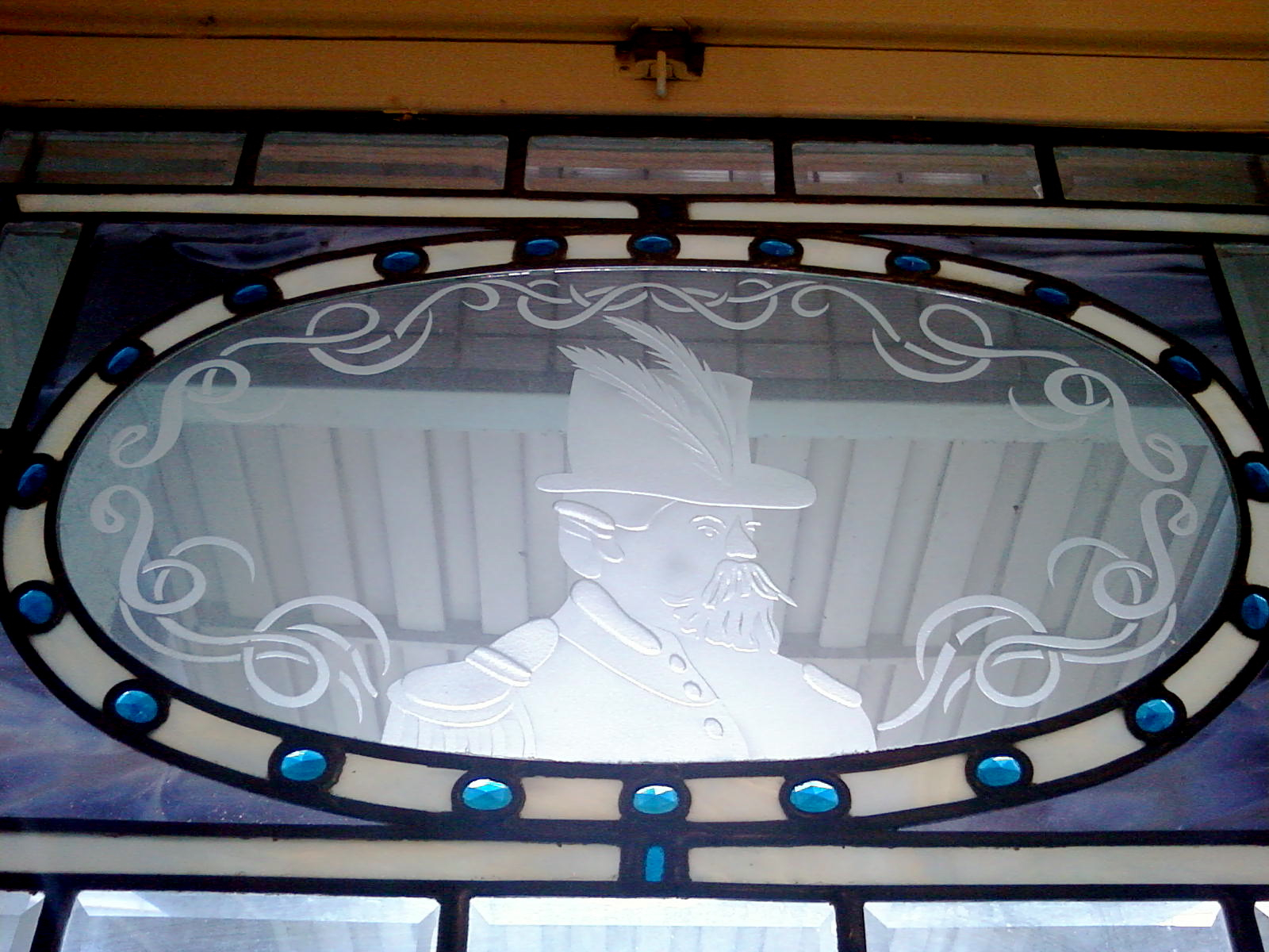   Glass etching in entry transom at the Emperor Norton Inn, 615 Post Street, San Francisco.  Creator and date unknown. Photograph ©&nbsp;2010  D. Huw Richardson . [Added 6.28.2016] 
