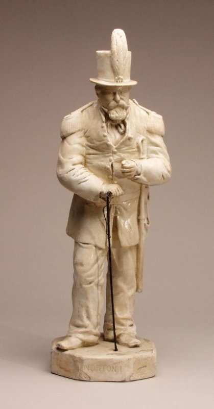   Emperor Norton statuette, 1877, by Herman J. Brand (1837–1914).  Plaster with metal walking stick, 22” x 7” x 7”. Collection of the Society of California Pioneers. Photograph:  Fine Arts Museums of San Francisco . For more, see our May 2023 article