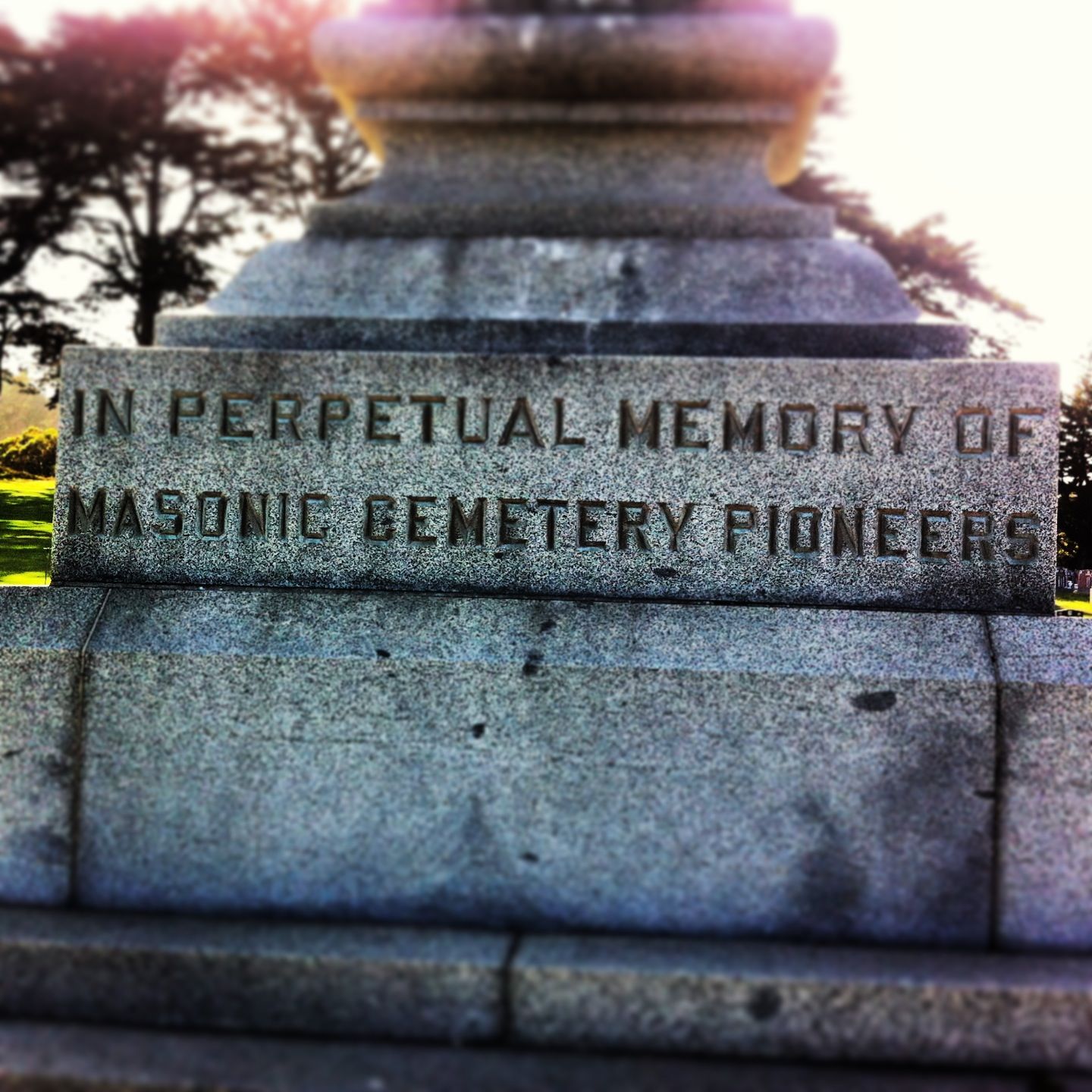 Masonic Cemetery monument at Woodlawn Memorial Park, in Colma, Calif. When he died in 1880, Emperor Norton was buried at the Masonic Cemetery in San Francisco, where he rested until his remains were moved to Woodlawn in 1934. As part of the great San Francisco cemetery eviction of the 1920s and 30s, most of the "residents" of the Masonic Cemetery found their way to Woodlawn, which originated as the new Masonic burial ground. Photograph © 2013 Bess Lovejoy. 