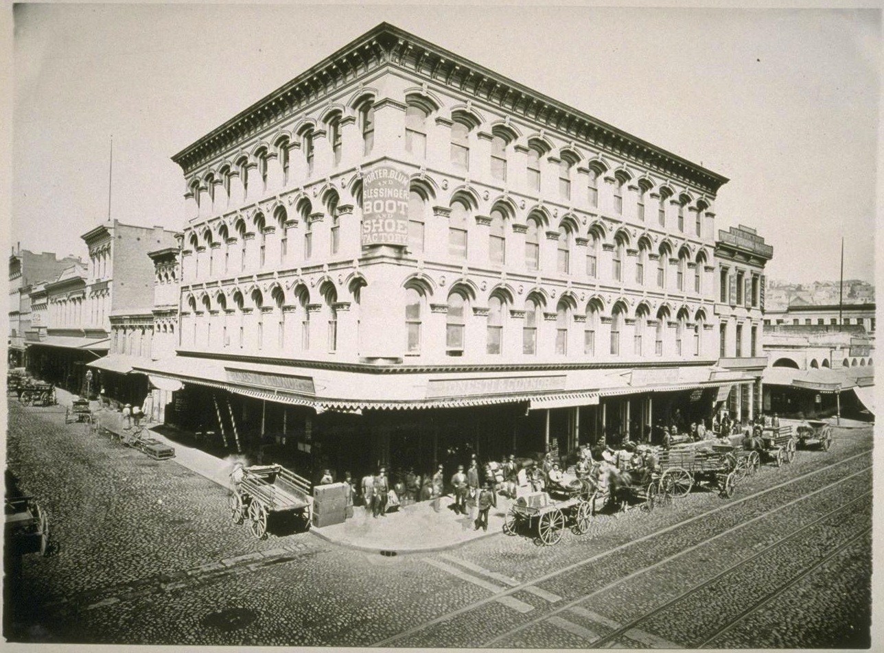 The Niantic Building (1872), at the northwest corner of Sansome (in the foreground) and Clay Streets, San Francisco. The building adjacent and to north, on Sansome, is 511 Sansome, at the southwest corner of Sansome and Merchant. Depending on when this photo was taken, Cuddy & Hughes and/or the Pacific Appeal newspaper may no longer have been operating out of the building. Photograph in the collection of the Bancroft Library at UC Berkeley. Source: Calisphere .