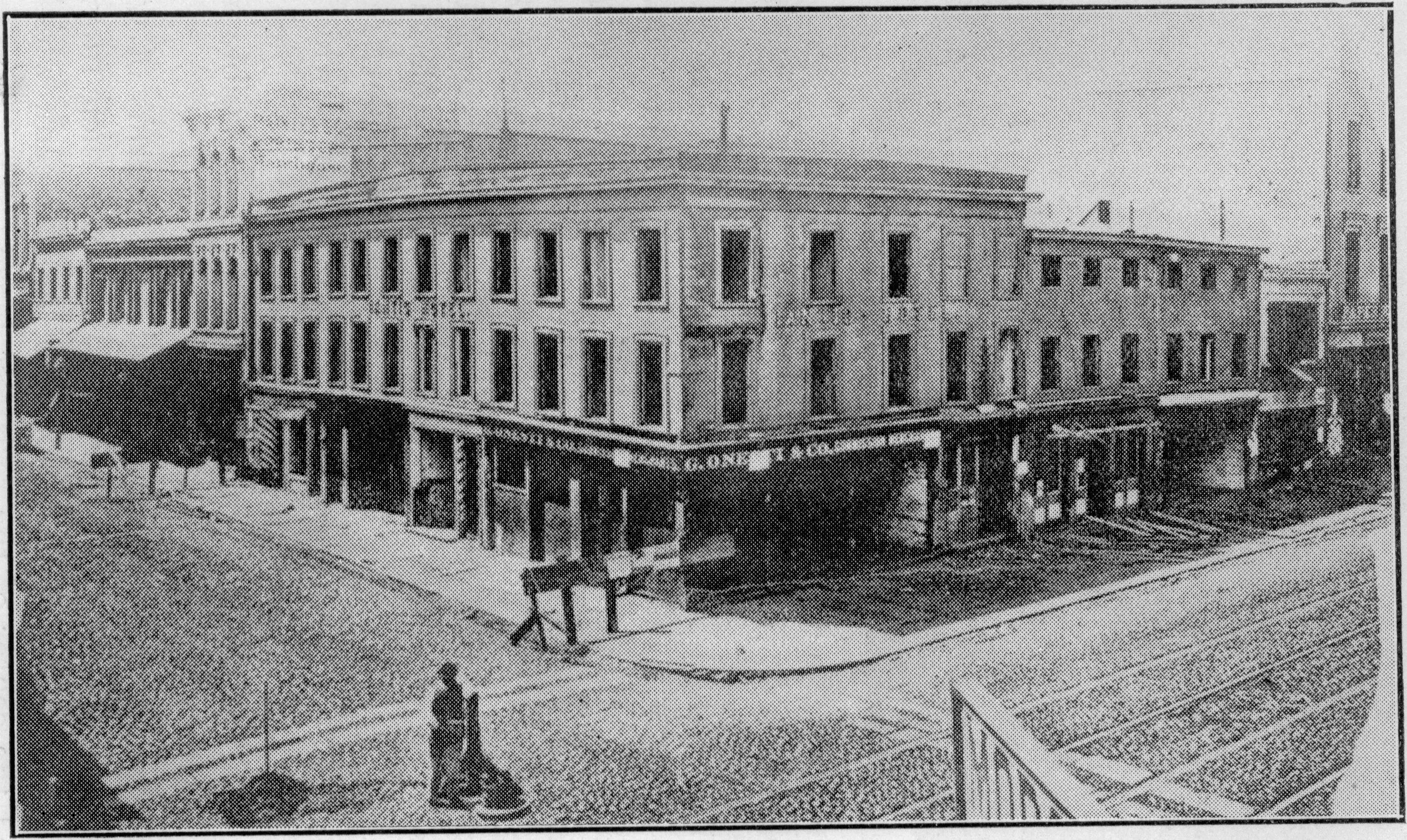 The second Niantic Hotel, at the northwest corner of Sansome and Clay Streets, San Francisco; possibly dated 1865. Both the printing firm of Cuddy & Hughes and the Pacific Appeal newspaper operated out of the building visible at the far right. Photograph from the collection of James R. Smith . 