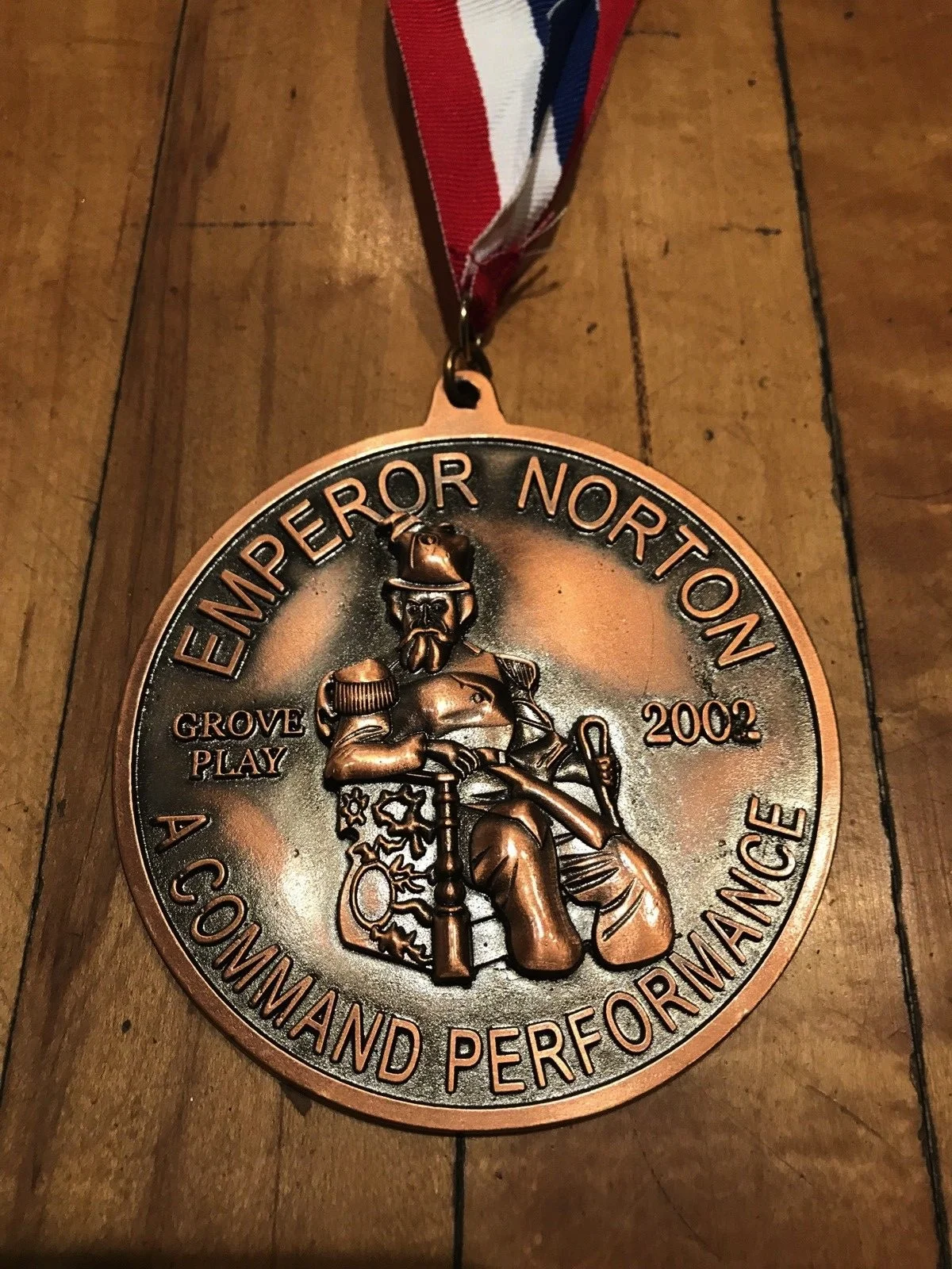 Medal, Bohemian Club, 2002. The Bohemian Club presented this medal, as a gift of thanks, to each member of the cast of Emperor Norton: A Command Performance , the 2002 Grove Play, performed on 26 July 2002. An item mentioning the medal appeared in the August 2002 newsletter of the Redwood Empire Chinese Association, here . Source: eBay . 