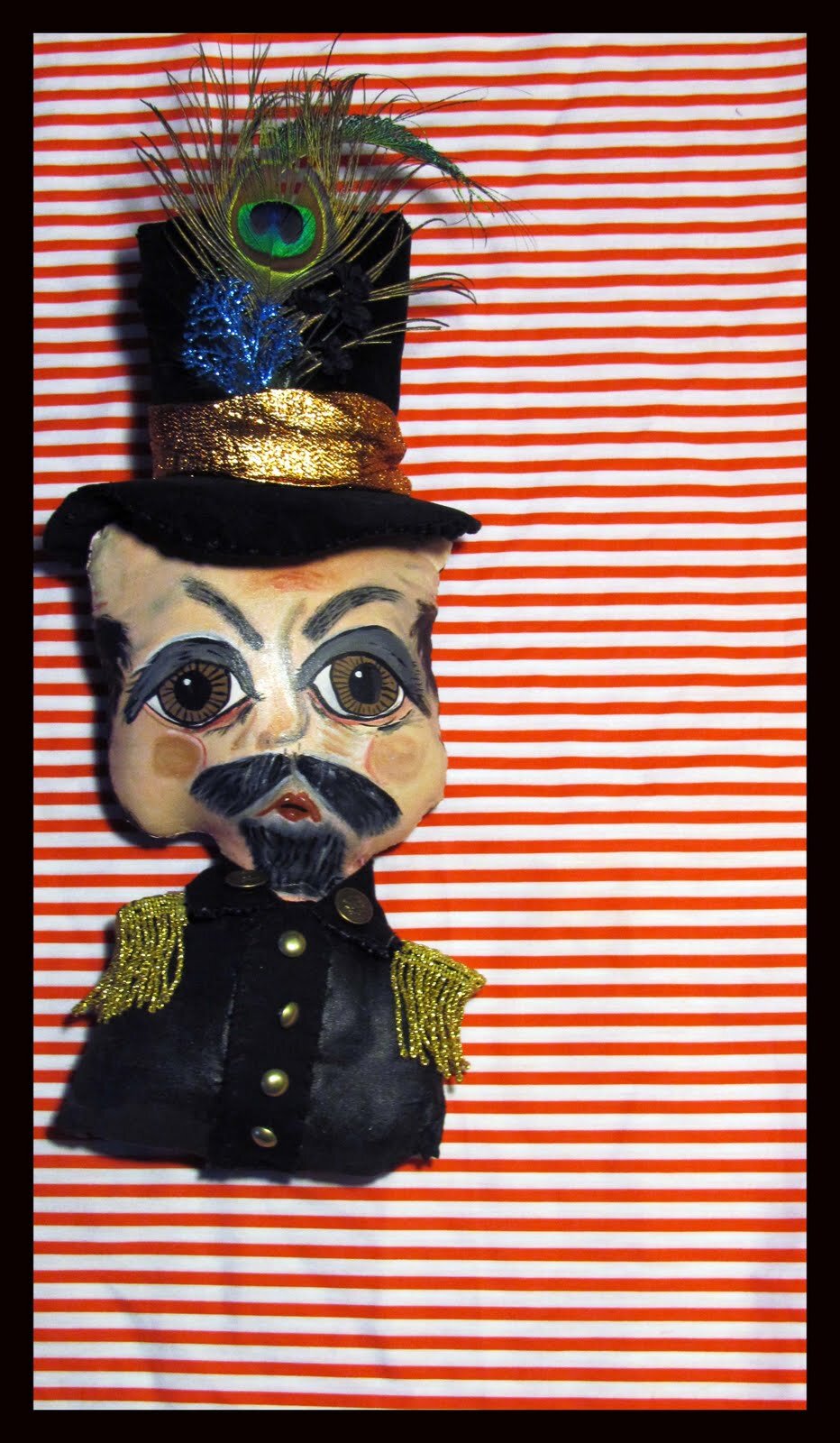   Emperor Norton doll, 2011, by Kook Teflon (b. 1973).  Hand-stitched cotton textile, vintage fabrics, acrylic paint. 15”h x 8”w. Part of the artist’s installation,  A Century of Barbary Eccentrics , at 1035 Guerrero Street, San Francisco, 26 Februar
