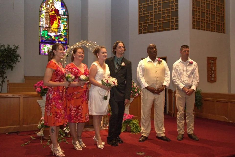 The wedding party - out of focus, on an angle, looking at someone else, no fill lighting, no professional posing, and yet this is one of the better ones that I have.