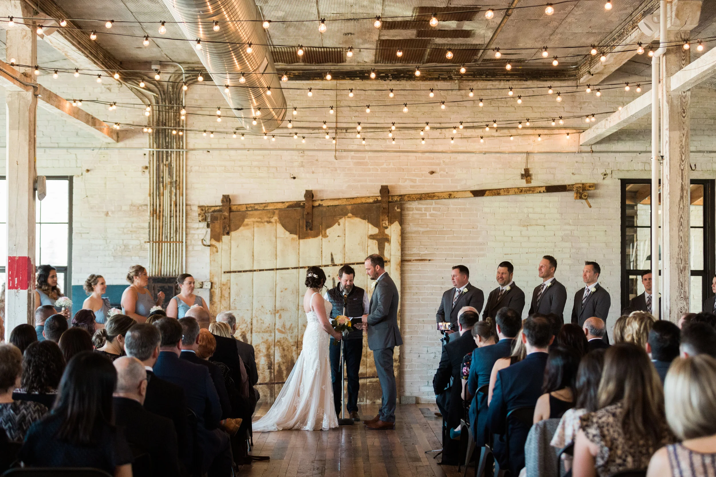 Natural light ceremony photo at Journeyman Distillery. Taken for Justin Hankins Photography.