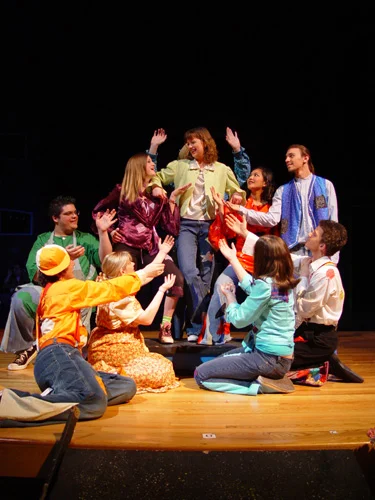 Front and center in Godspell during my sophomore year of high school (note the bad perm, bangs and braces.) What I consider to my first "serious" stepping stone towards committing to a legitimate lifelong acting career.