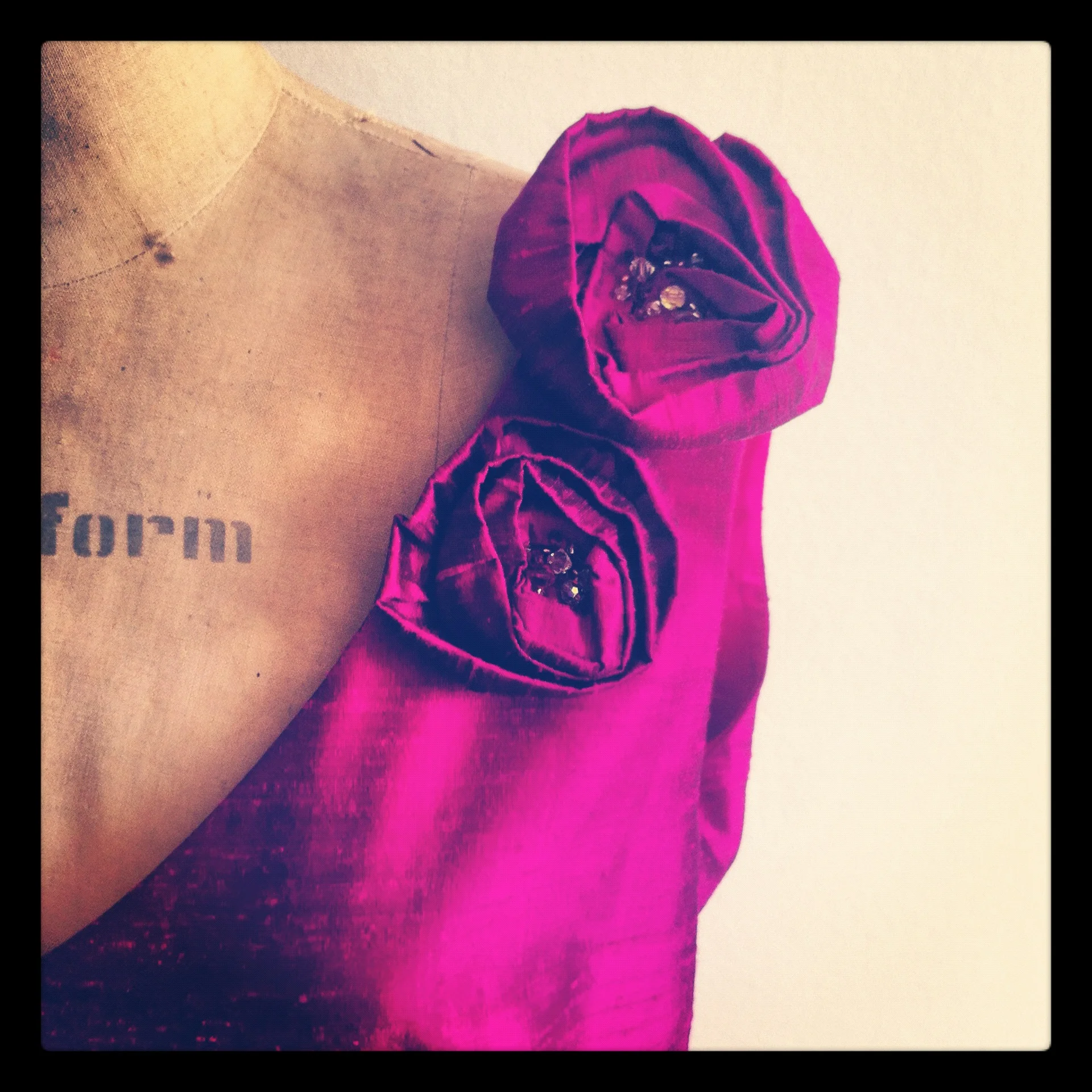 Floral detail on a silk shift dress