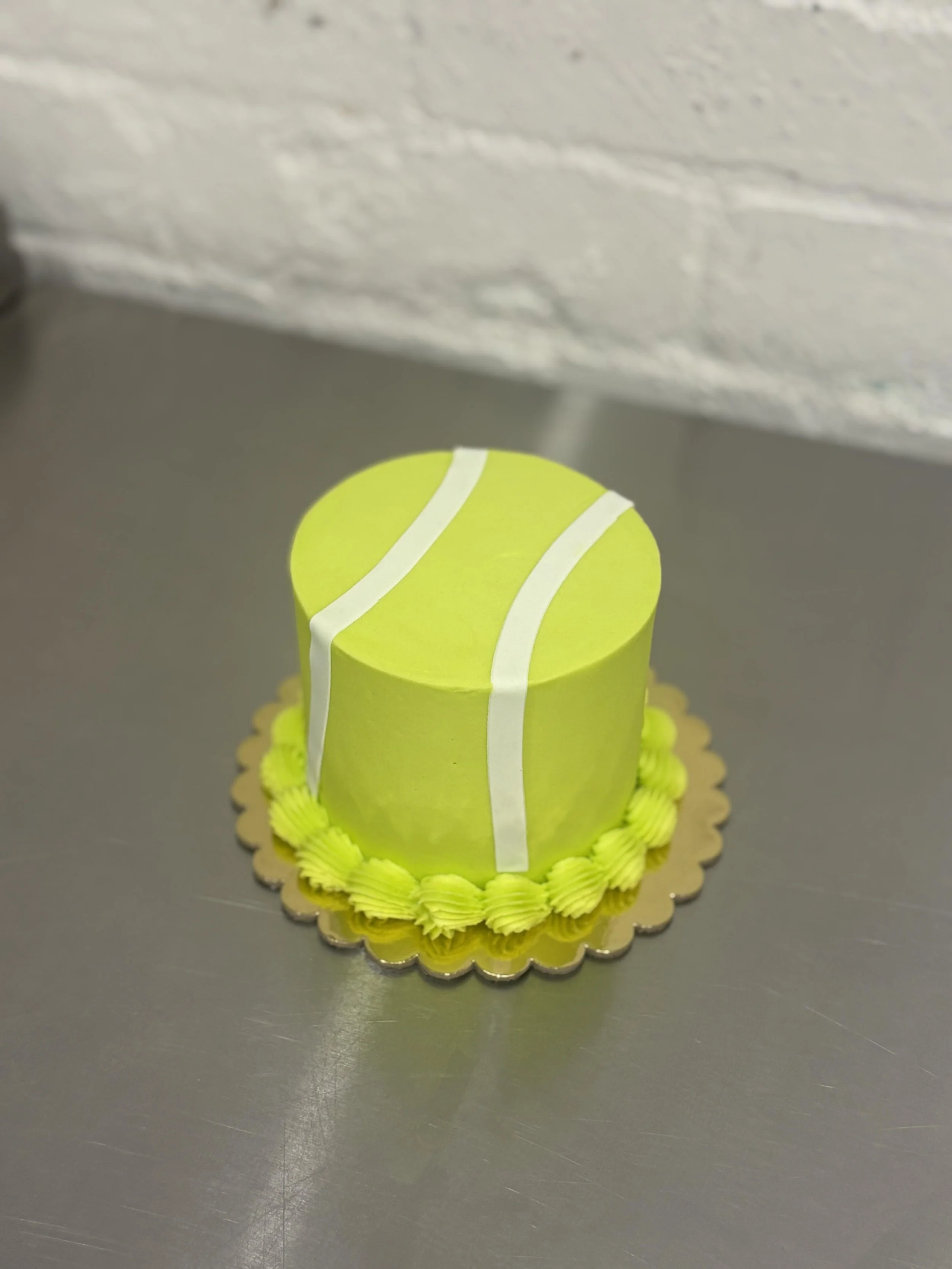Round-Tennis-Ball-Buttercream-Cake.jpg