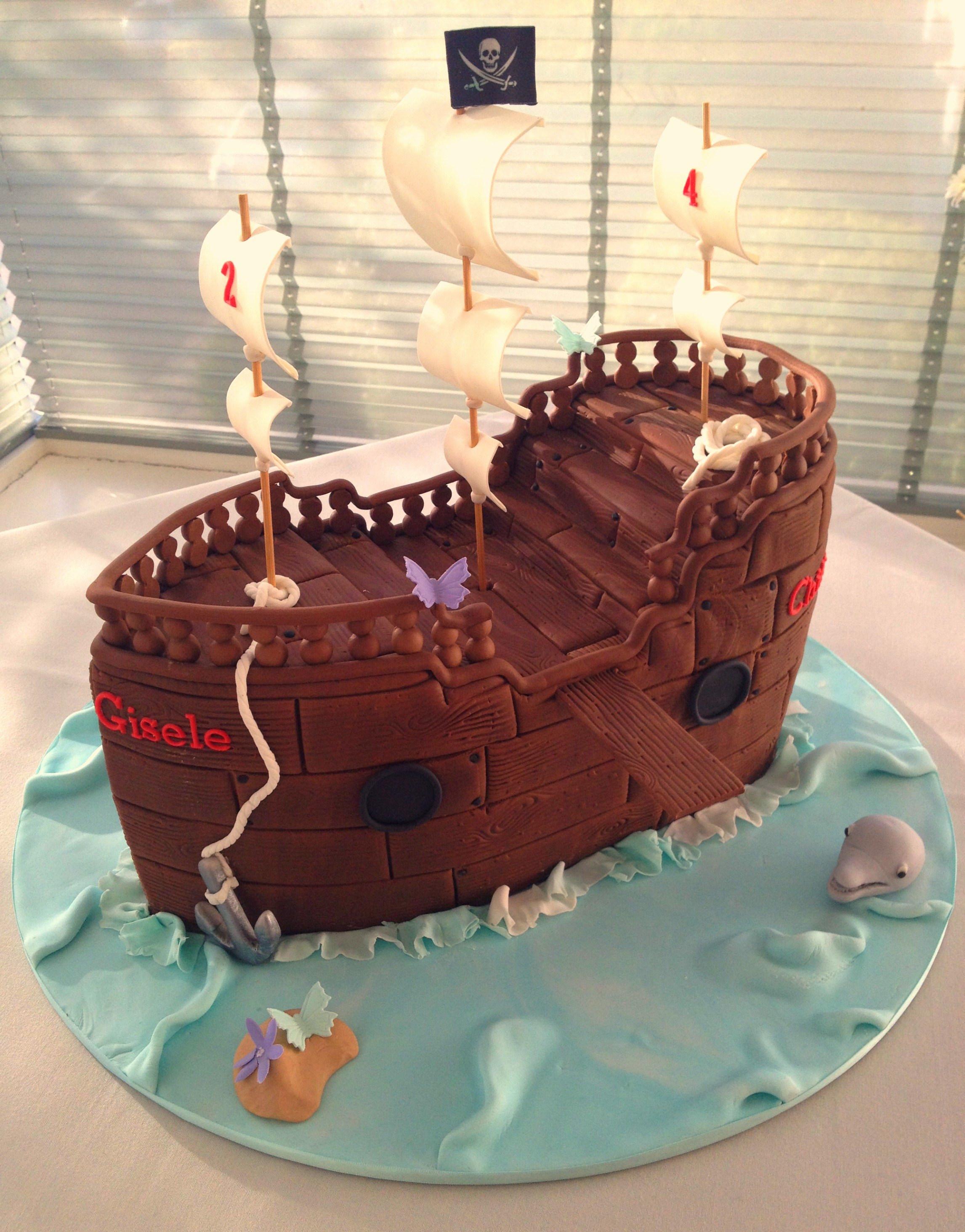 Chili & Gigi's Pirate Ship Cake.png
